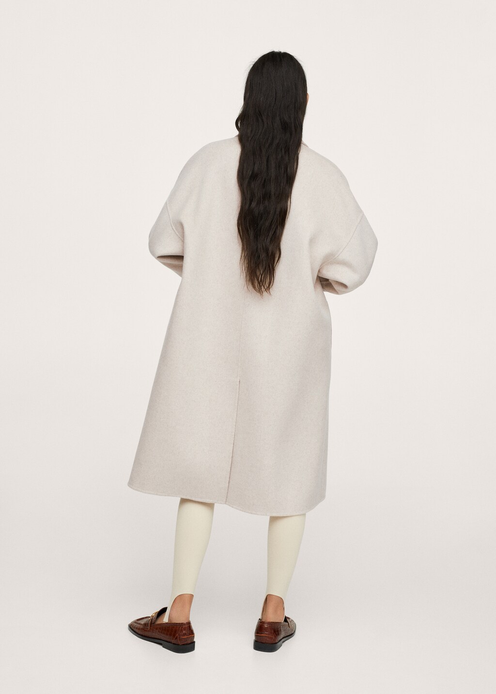 Handmade wool coat - Reverse of the article