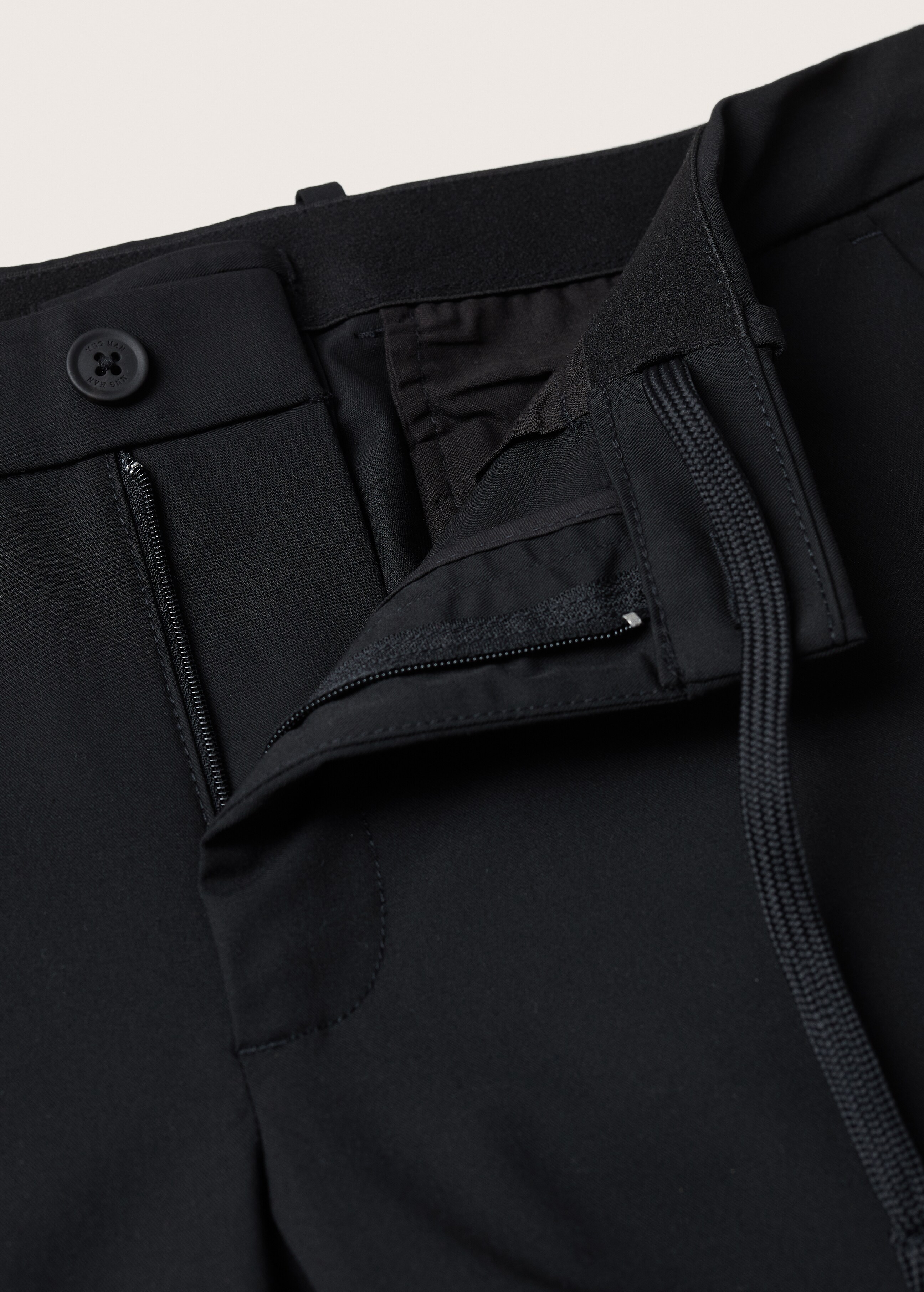 Tapered fit stretch trousers - Details of the article 8