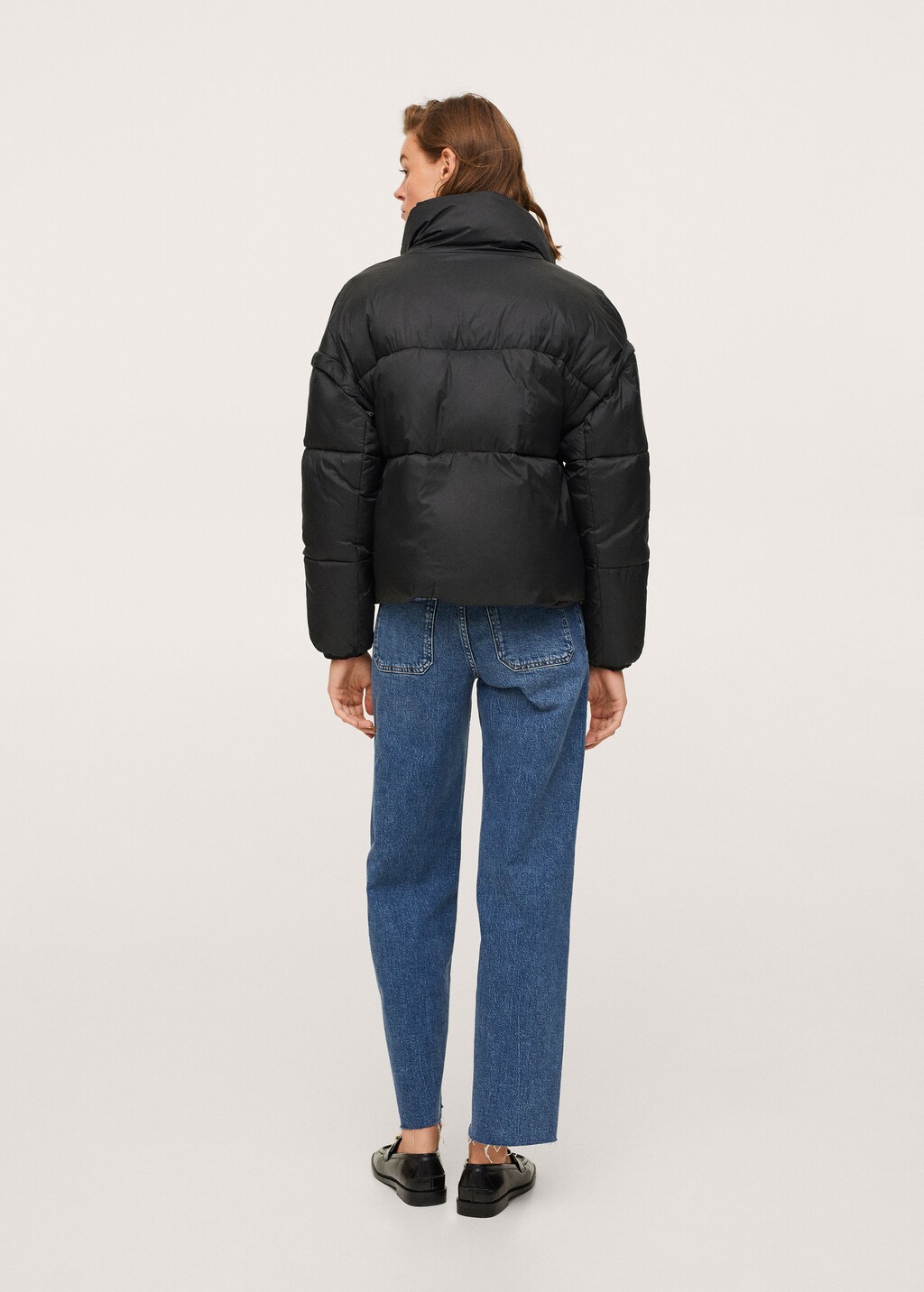 Padded jacket with detachable sleeves - Reverse of the article