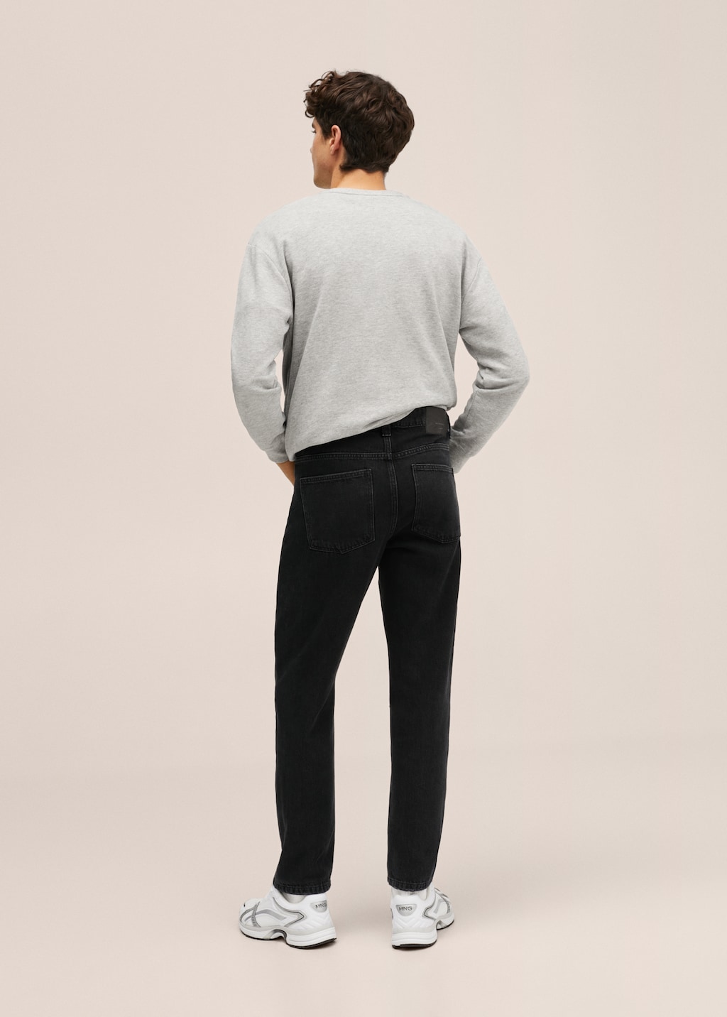 Slim fit jeans met decoratieve scheuren - Achterkant van het artikel