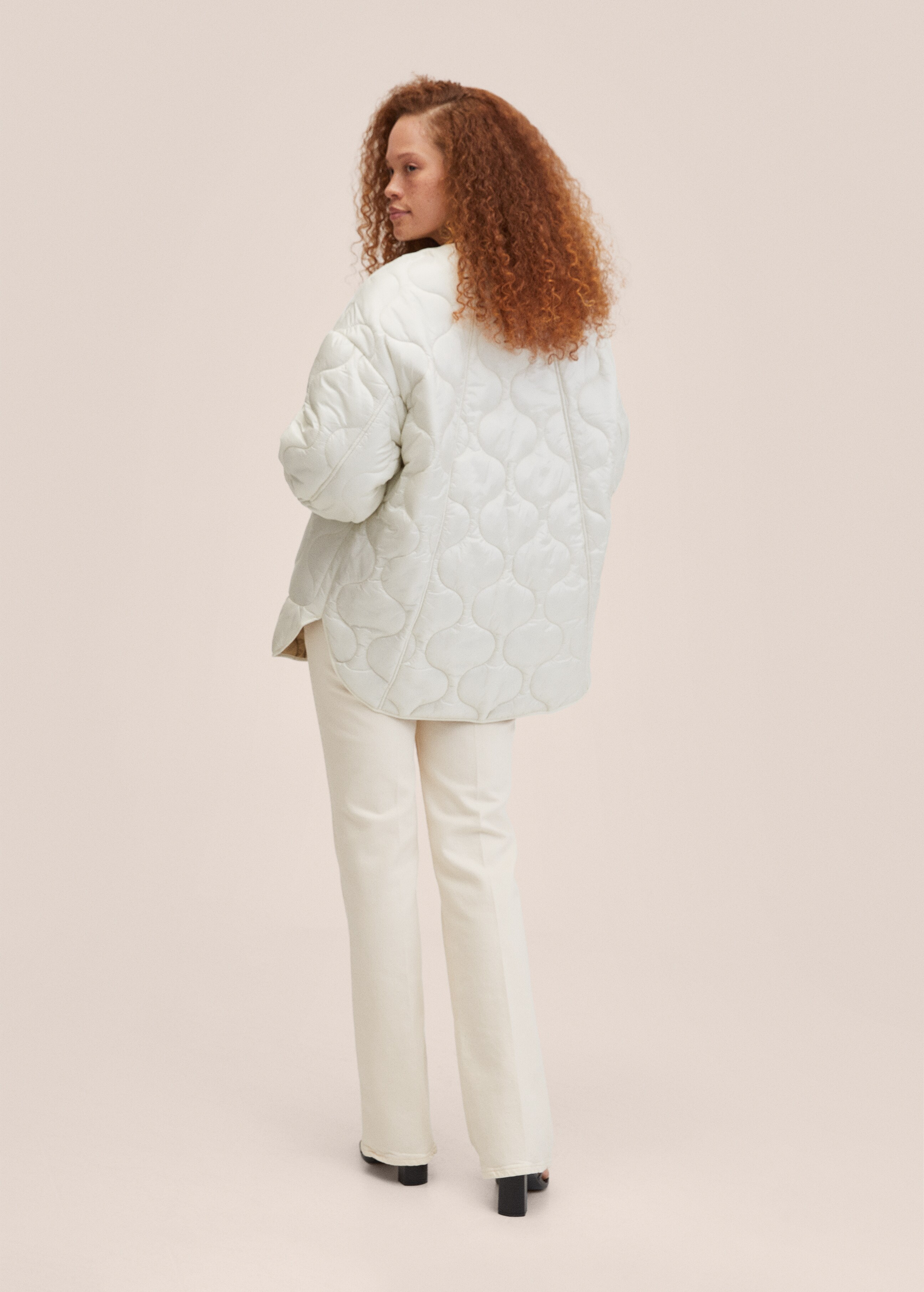 Oversize quilted coat - Reverse of the article