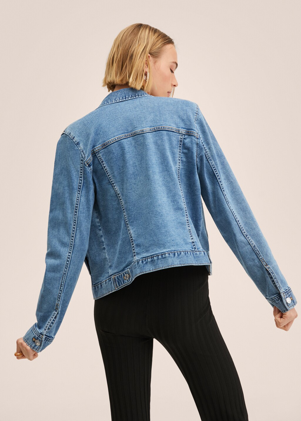 Pocketed denim jacket - Reverse of the article