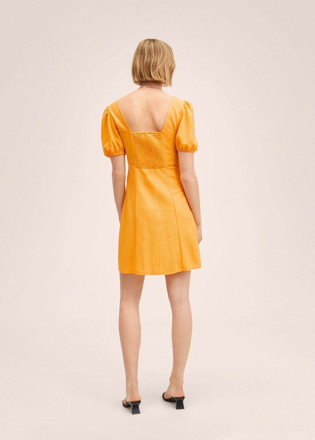 Flowy puffed-sleeve dress - Reverse of the article