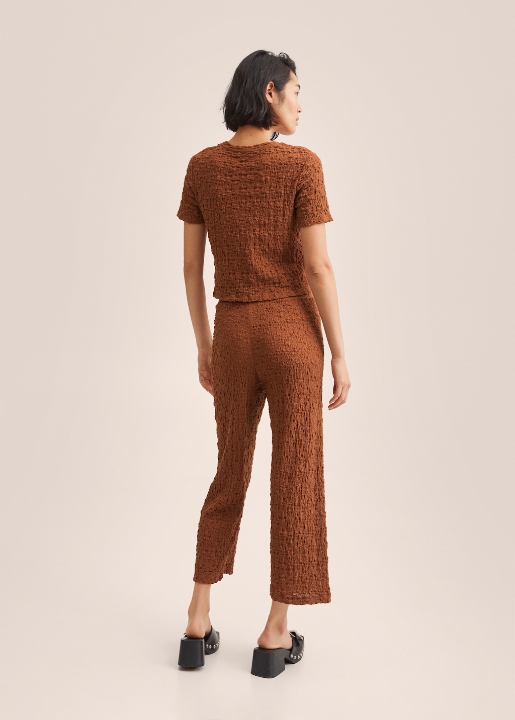 Textured cotton pants - Reverse of the article