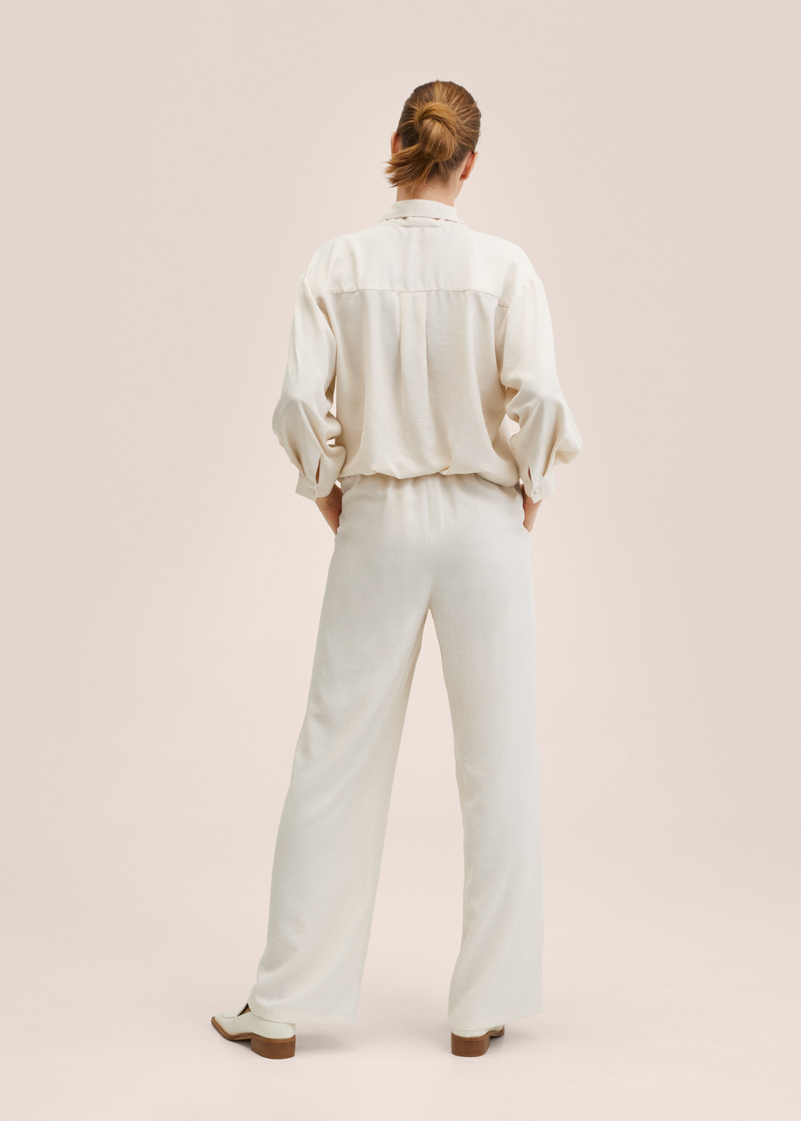 Textured flowy trousers - Reverse of the article