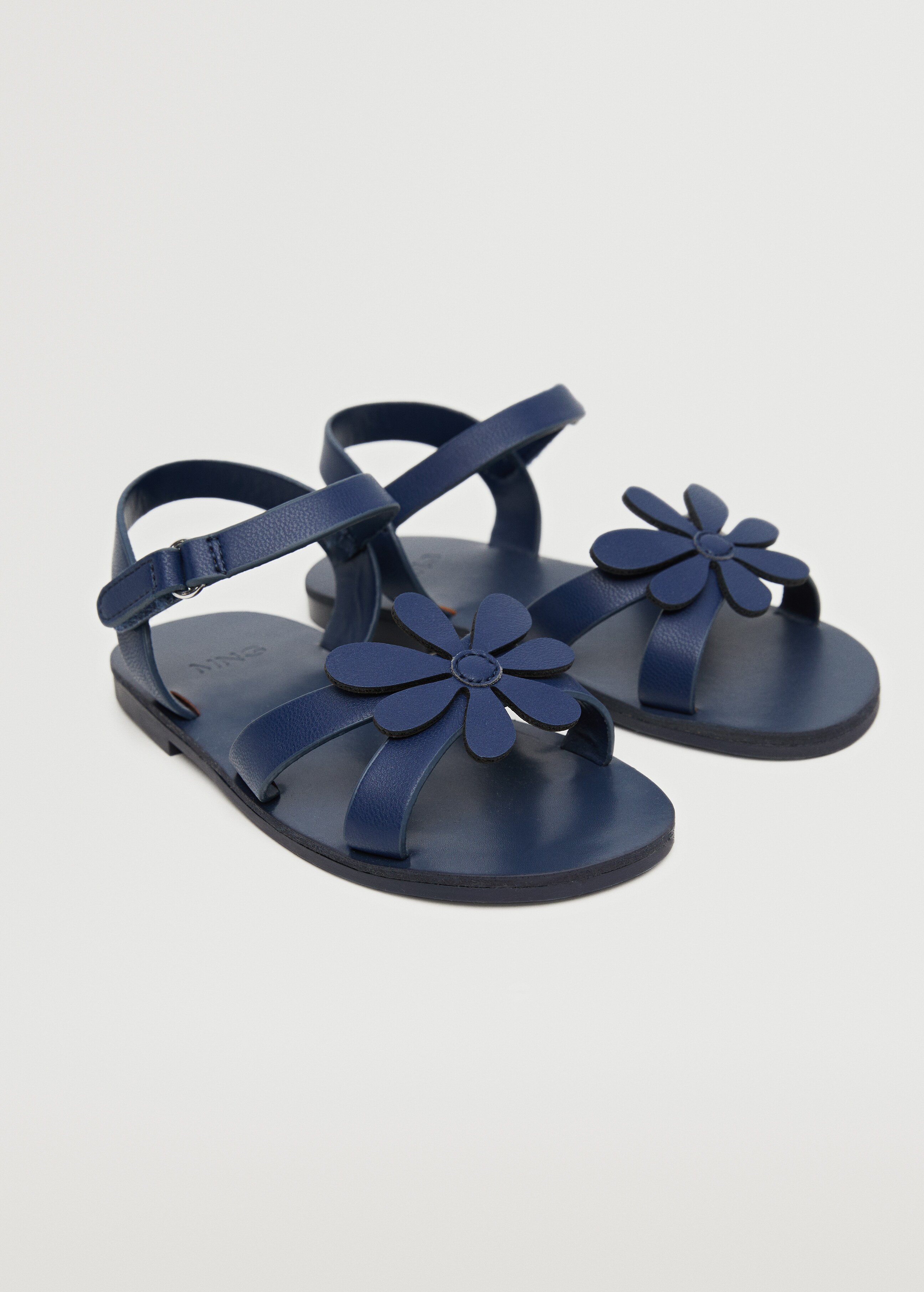 Flower appliqué sandals - Medium plane