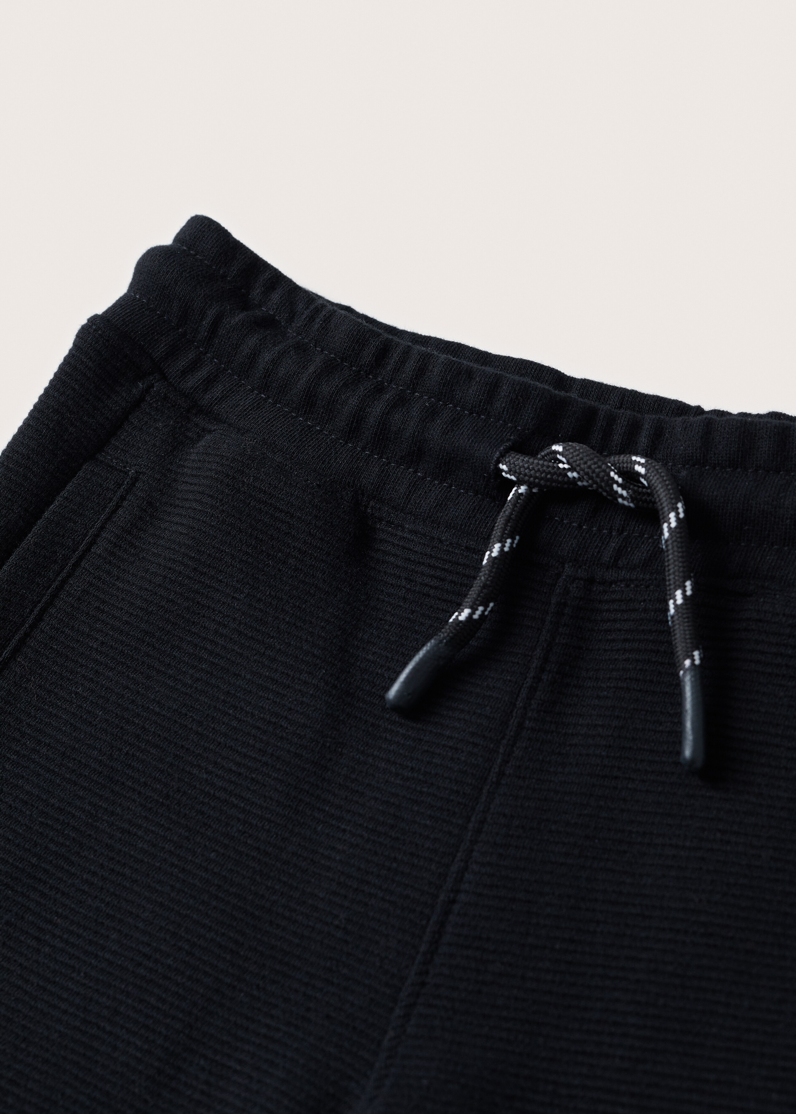 Textured jogger trousers - Details of the article 8