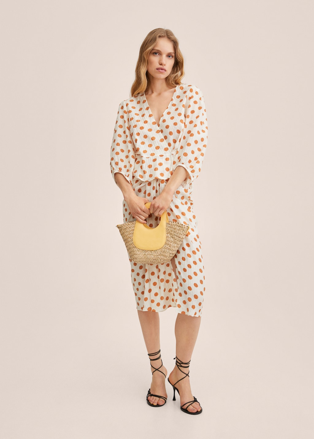 Polka-dot pleated blouse