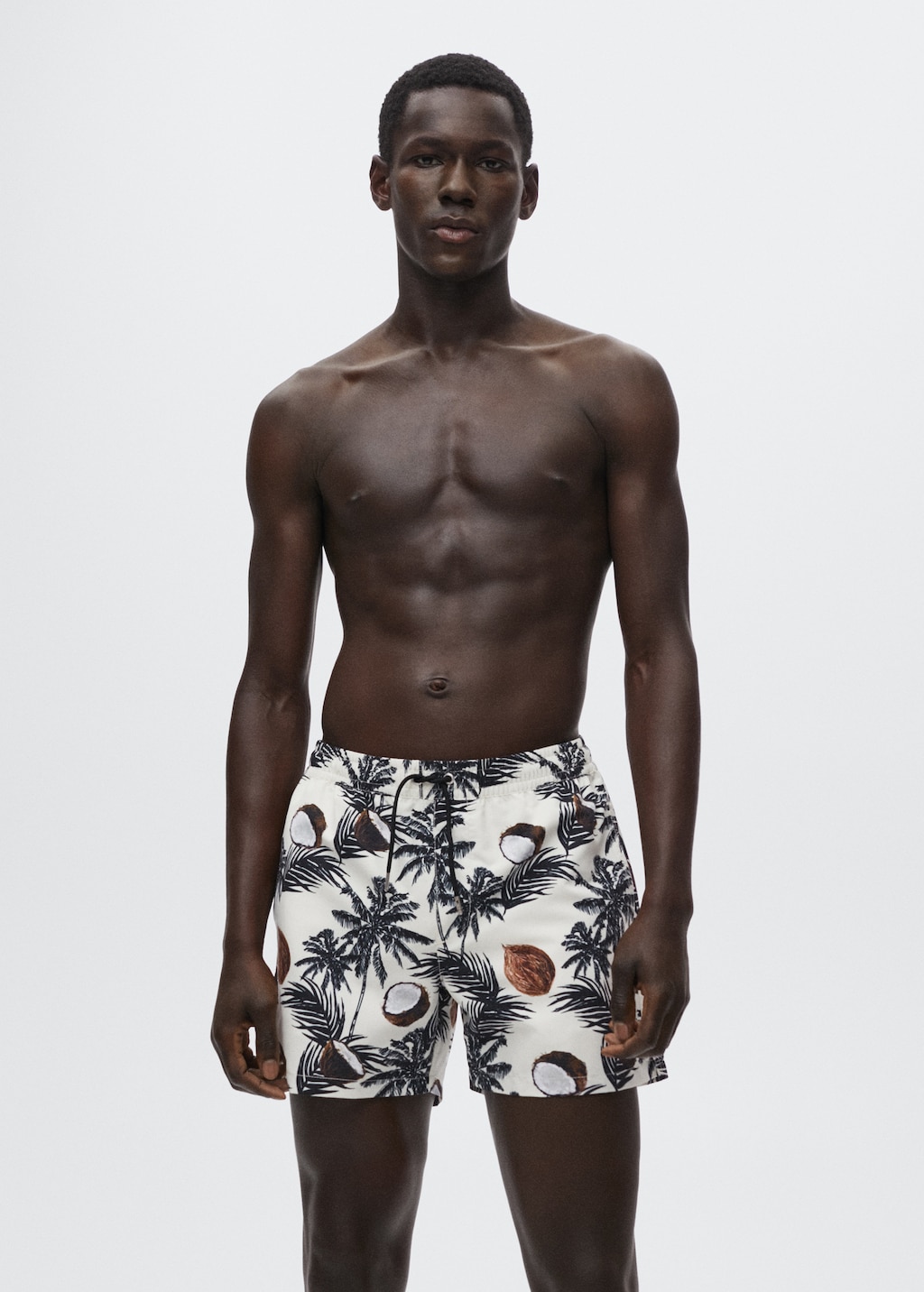 Hawaiian print swimming trunks