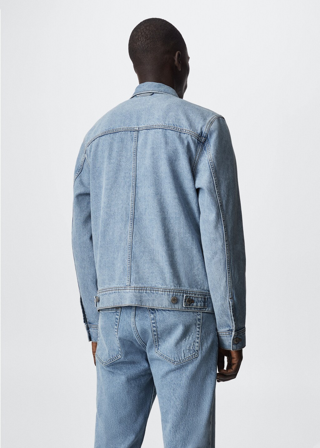 Pocketed denim jacket - Reverse of the article