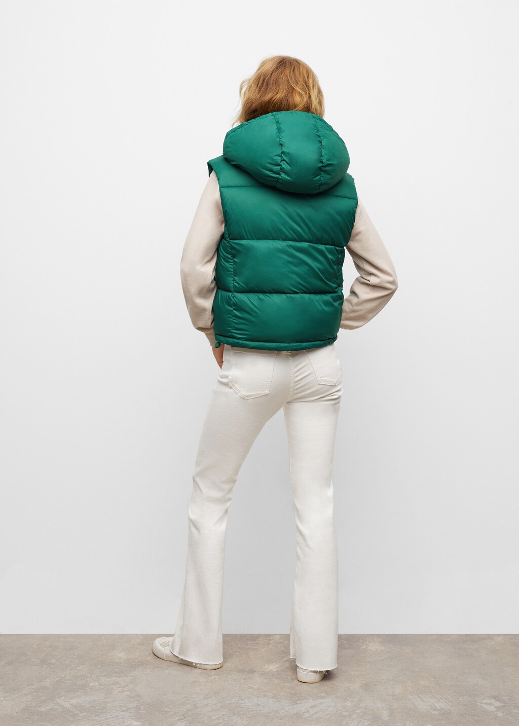 Quilted gilet with hood - Reverse of the article