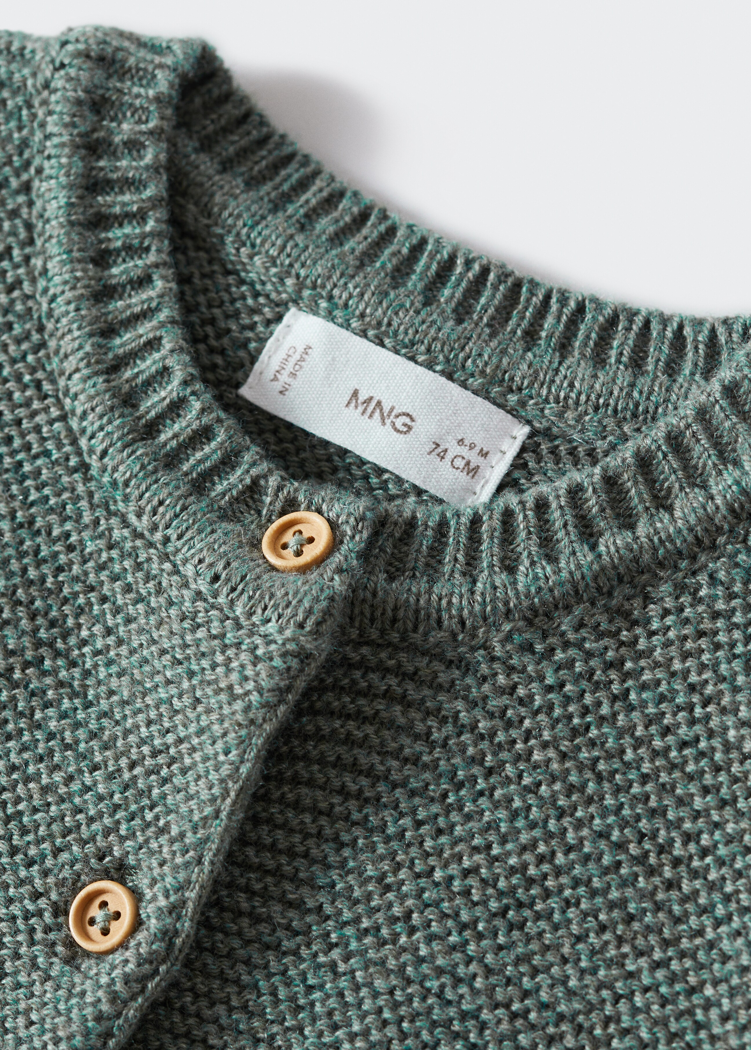 Avigstickad cardigan - Detaljer om artikeln 9