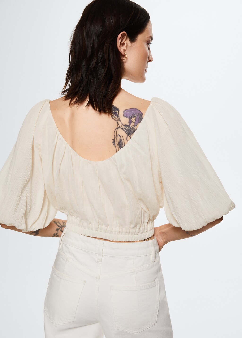 Puffed sleeves blouse - Reverse of the article