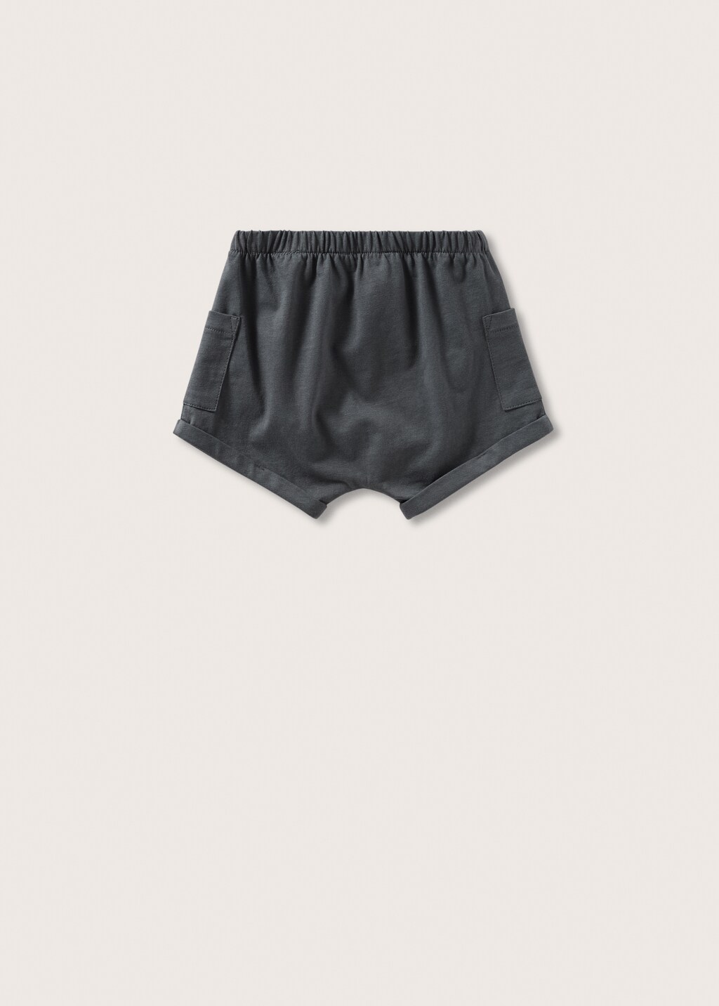 Side pockets shorts - Reverse of the article