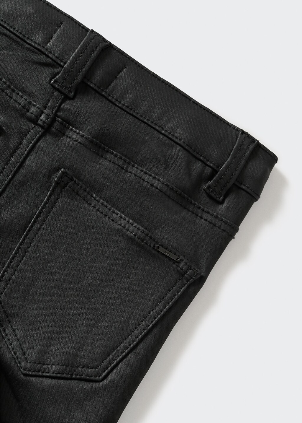 Coated skinny-fit trousers - Details of the article 8