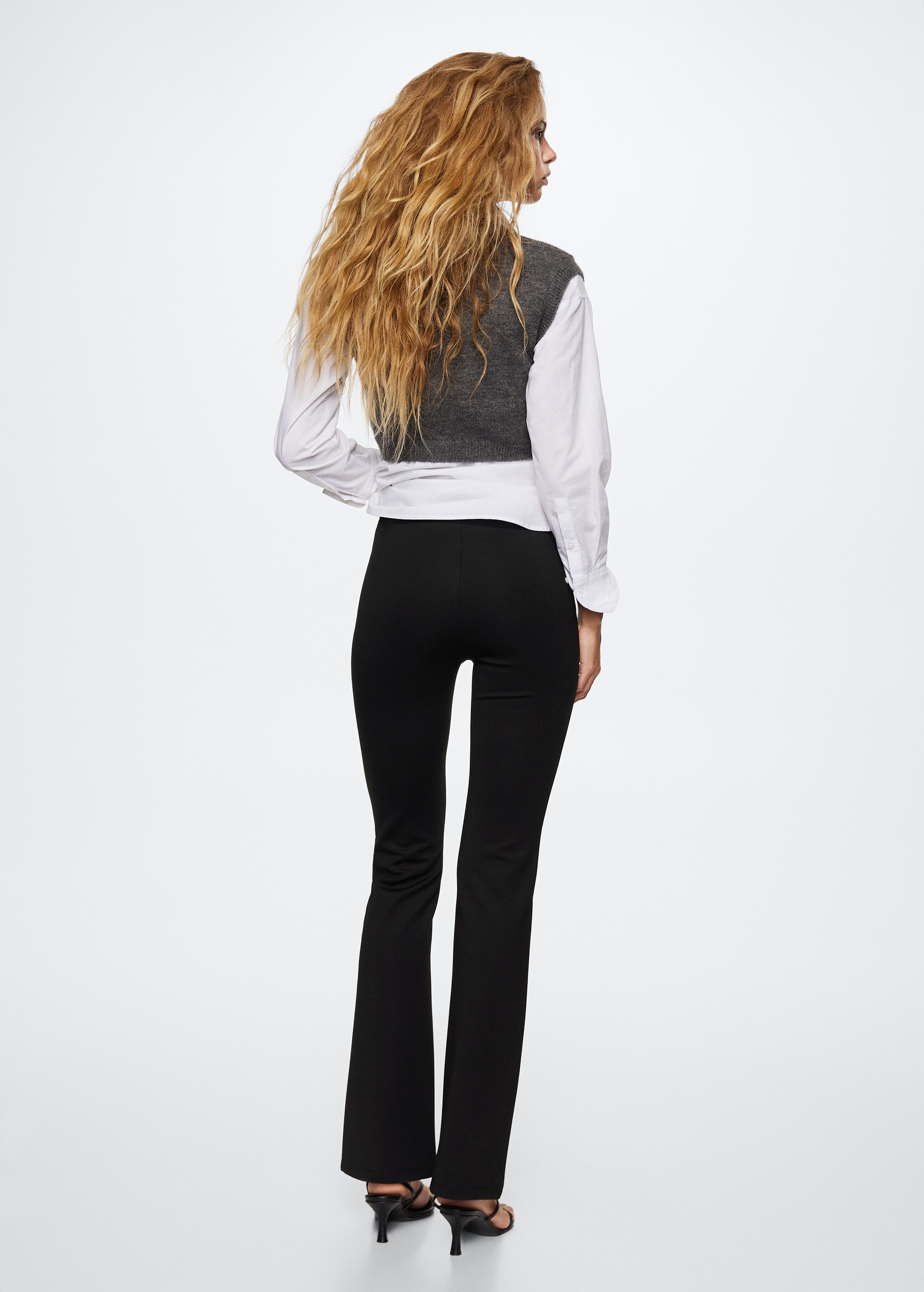 Flared buttoned trousers - Reverse of the article