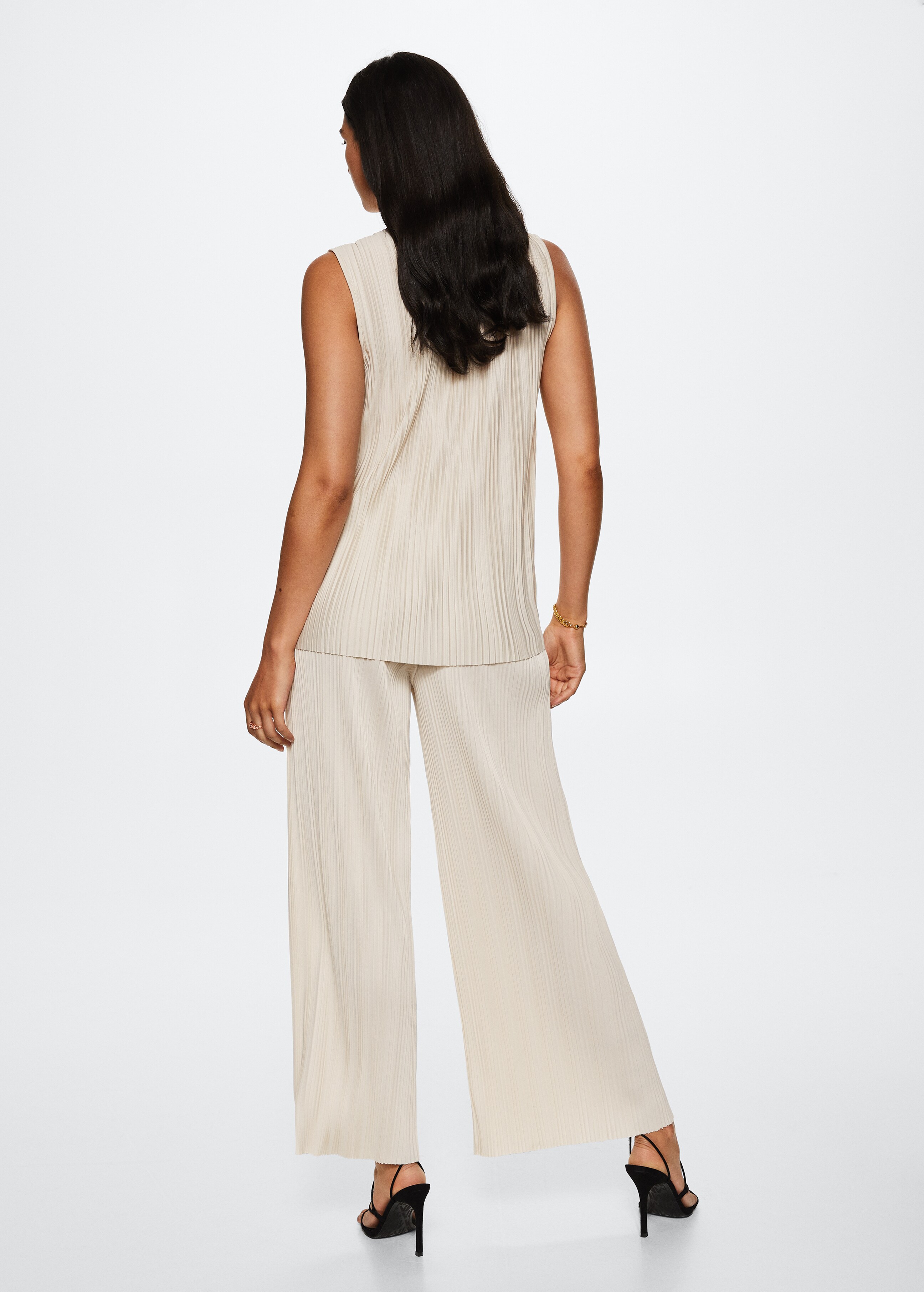 Pleated palazzo pants - Reverse of the article