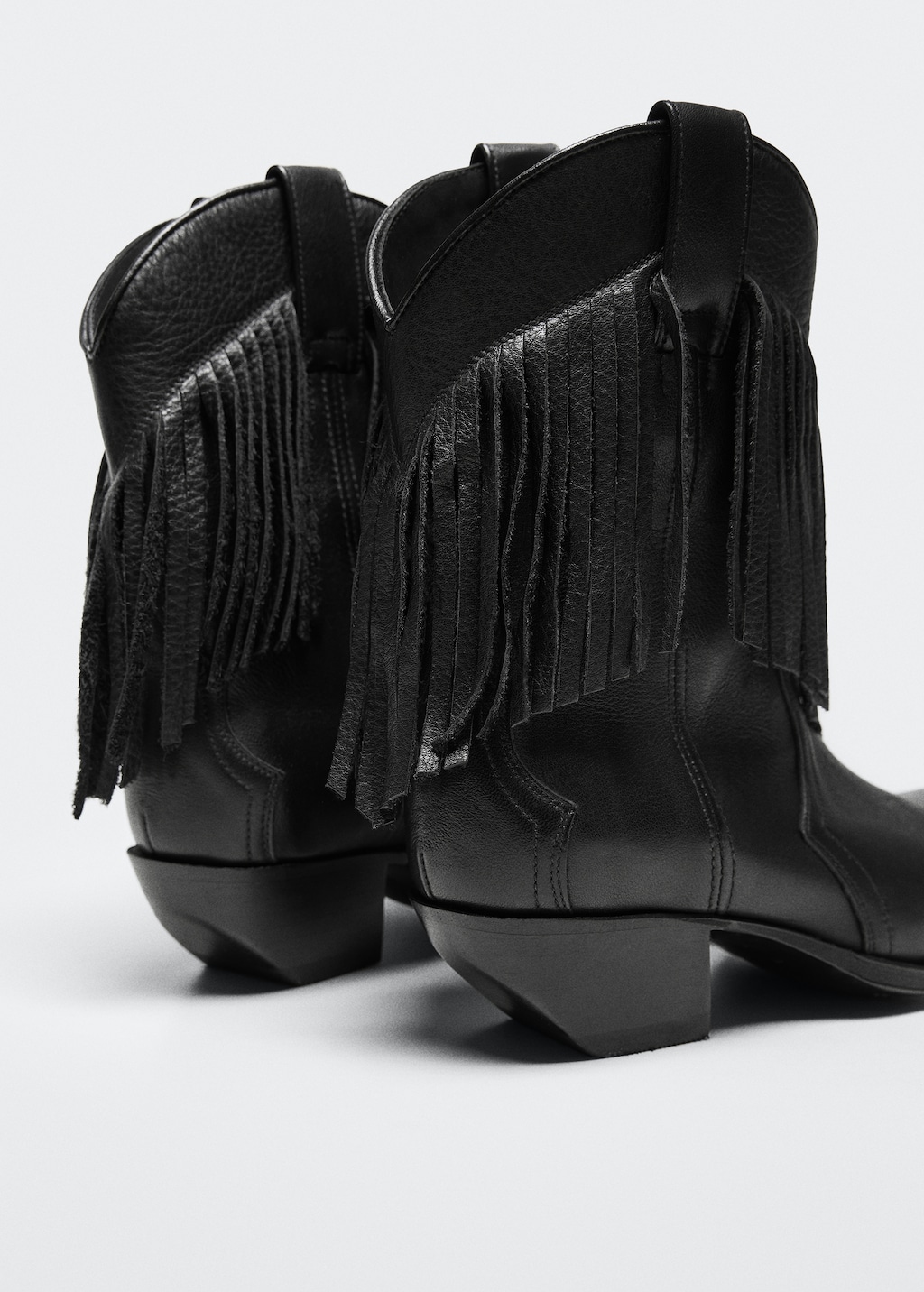 Fringed leather boots