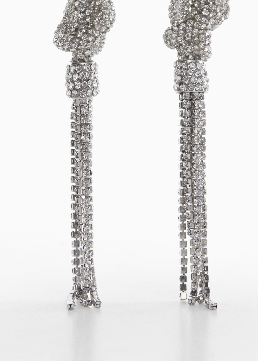 Earrings with crystals knots