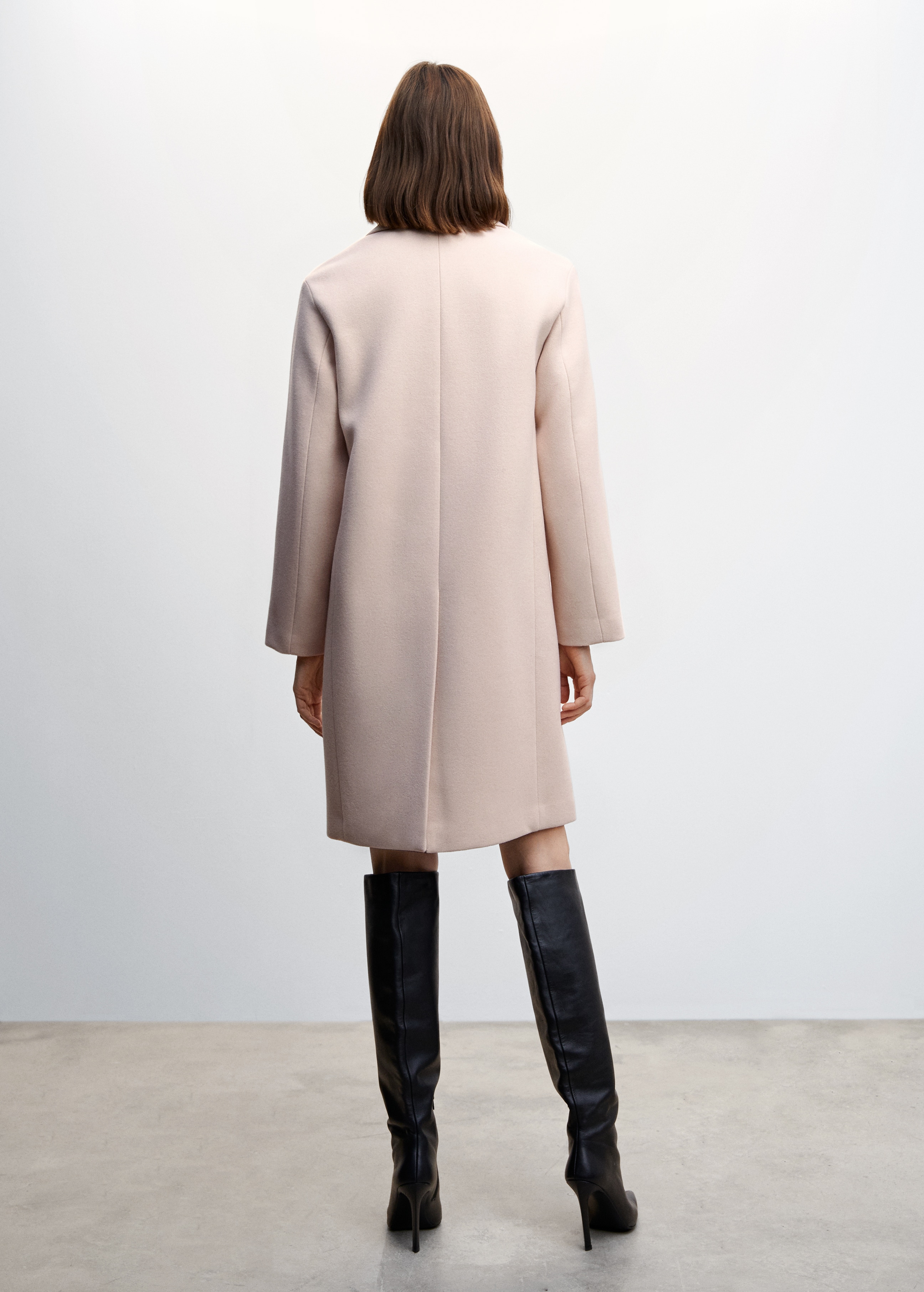 Buttoned wool coat - Reverse of the article