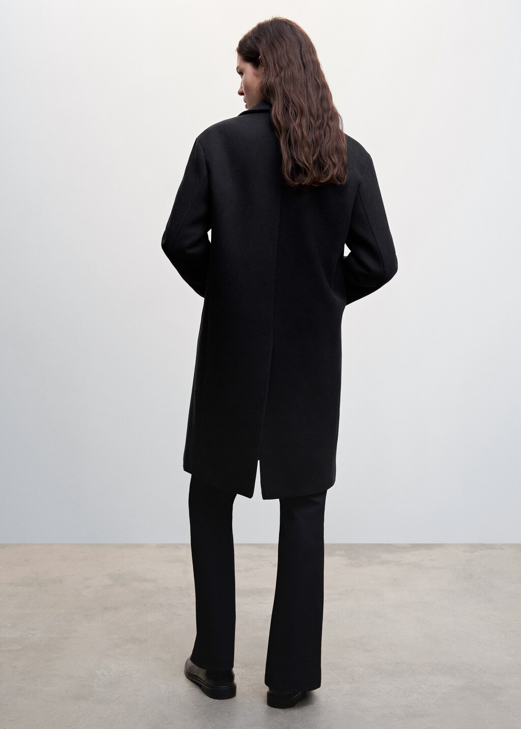 Buttoned wool coat - Reverse of the article