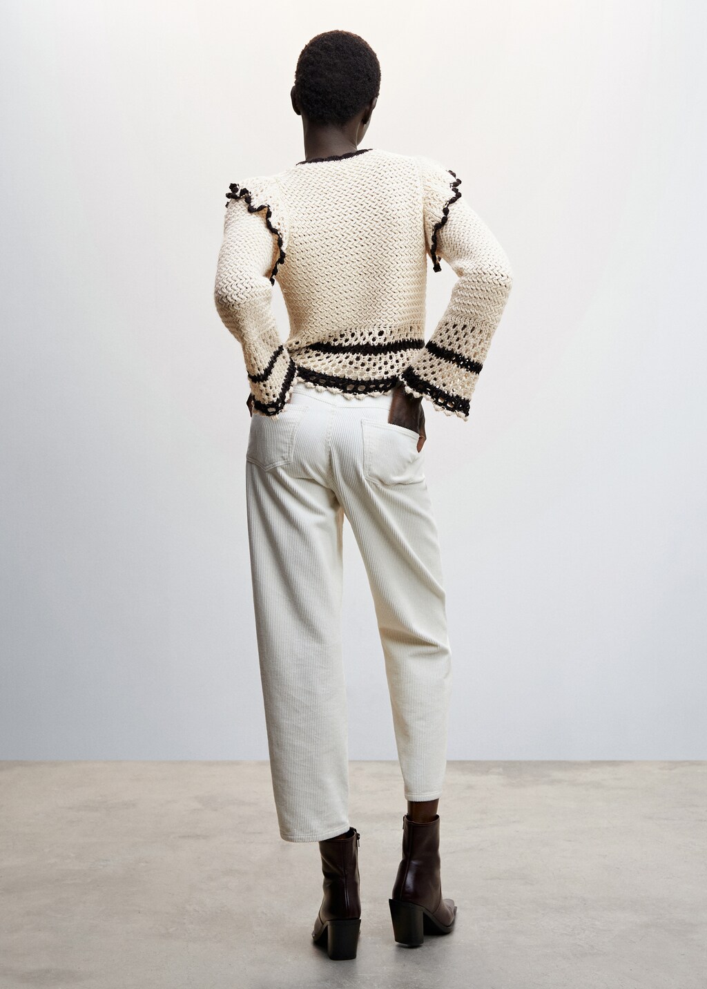 Sweater with ruffled openwork details - Reverse of the article