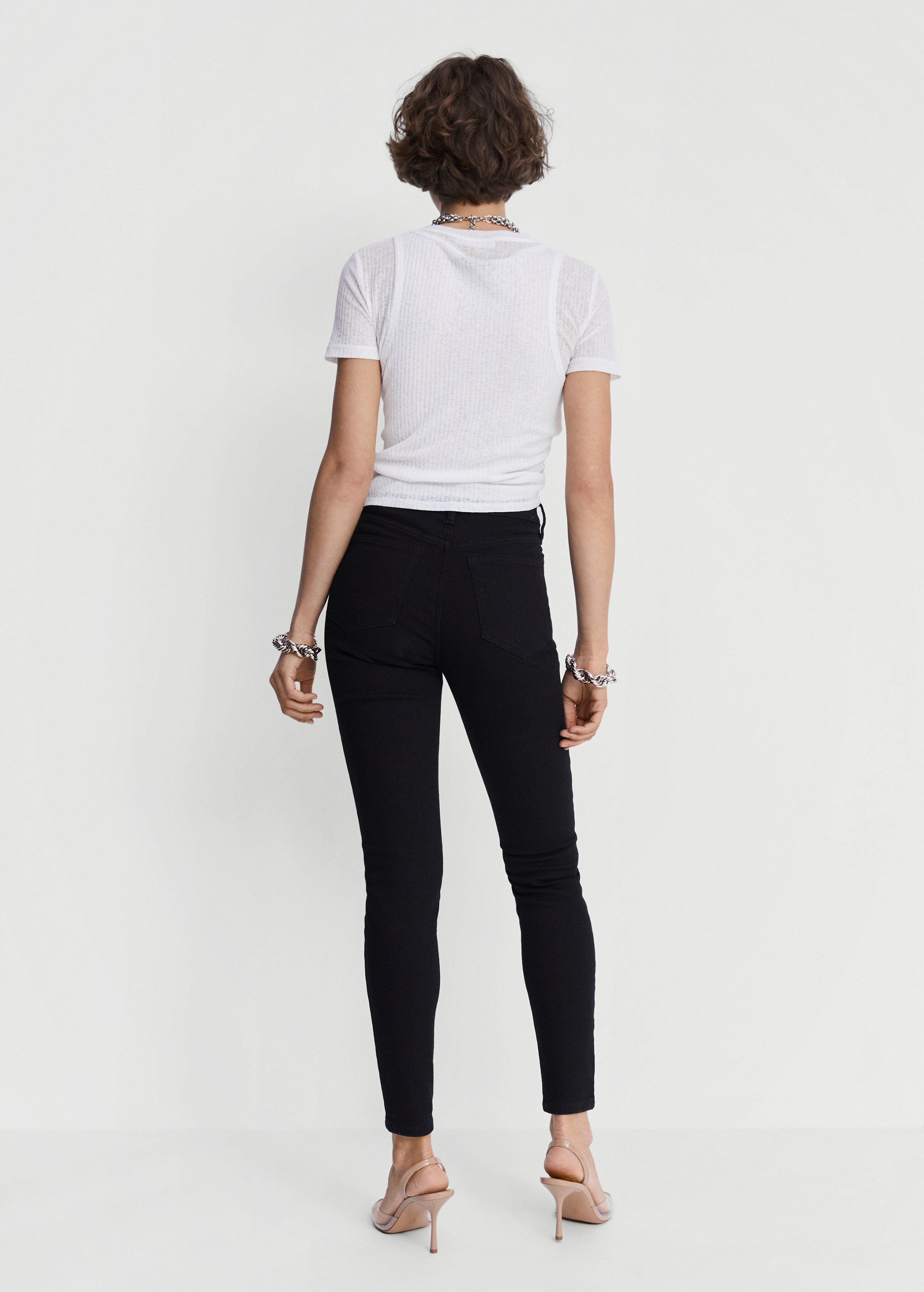 Skinny Jeans mit hohem Bund - Rückseite des Artikels