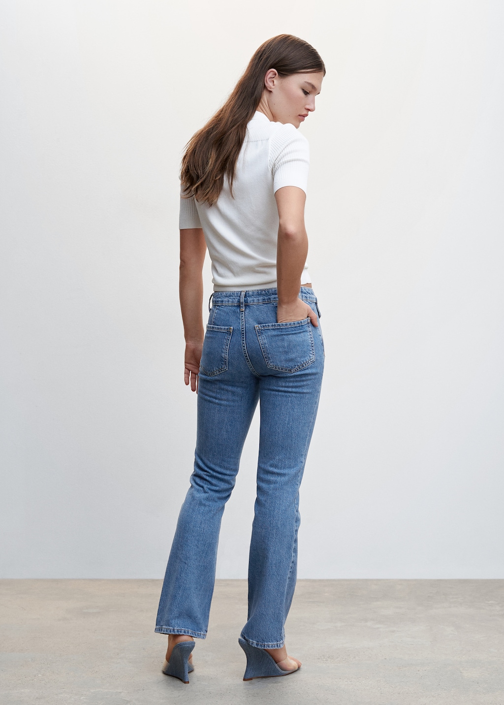 Flared jeans with pocket - Reverse of the article