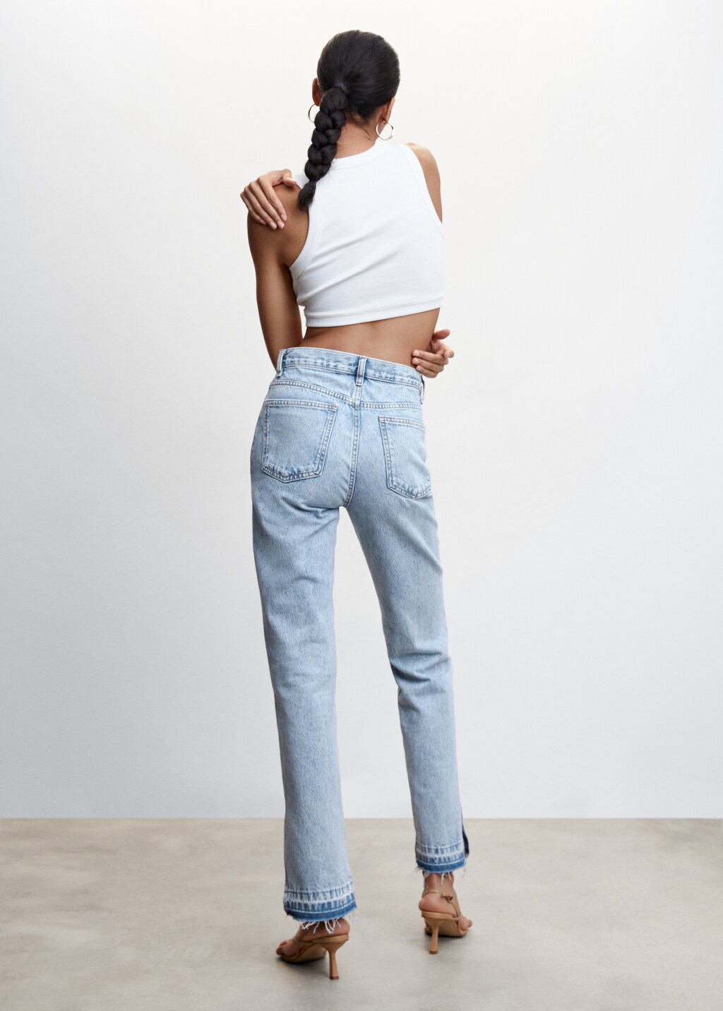 High-rise straight jeans with slits - Reverse of the article