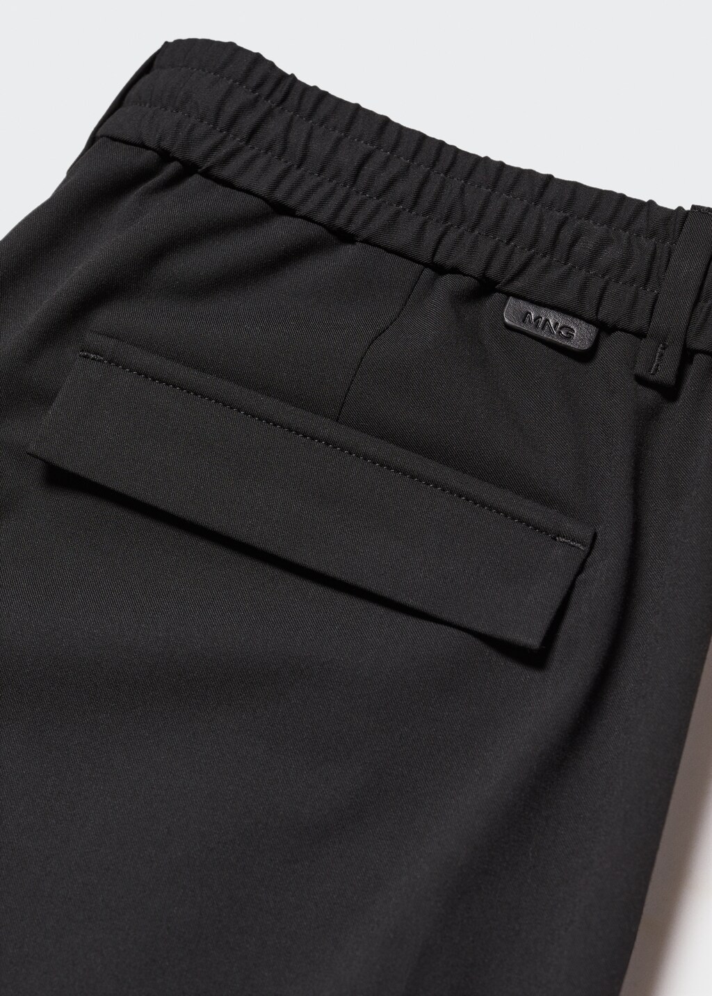 Pleated slim-fit trousers - Details of the article 8