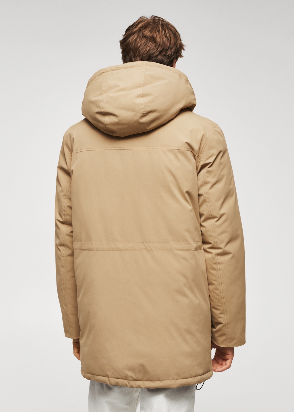 Quilted hooded parka - Reverse of the article