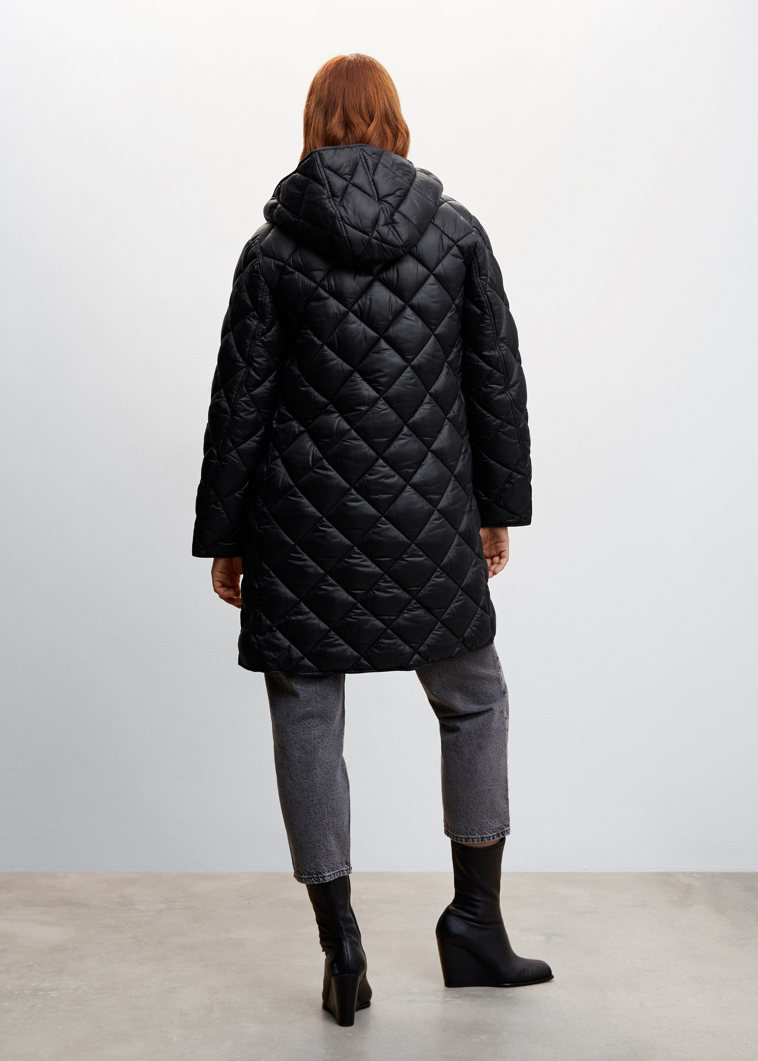 Hood quilted coat - Reverse of the article