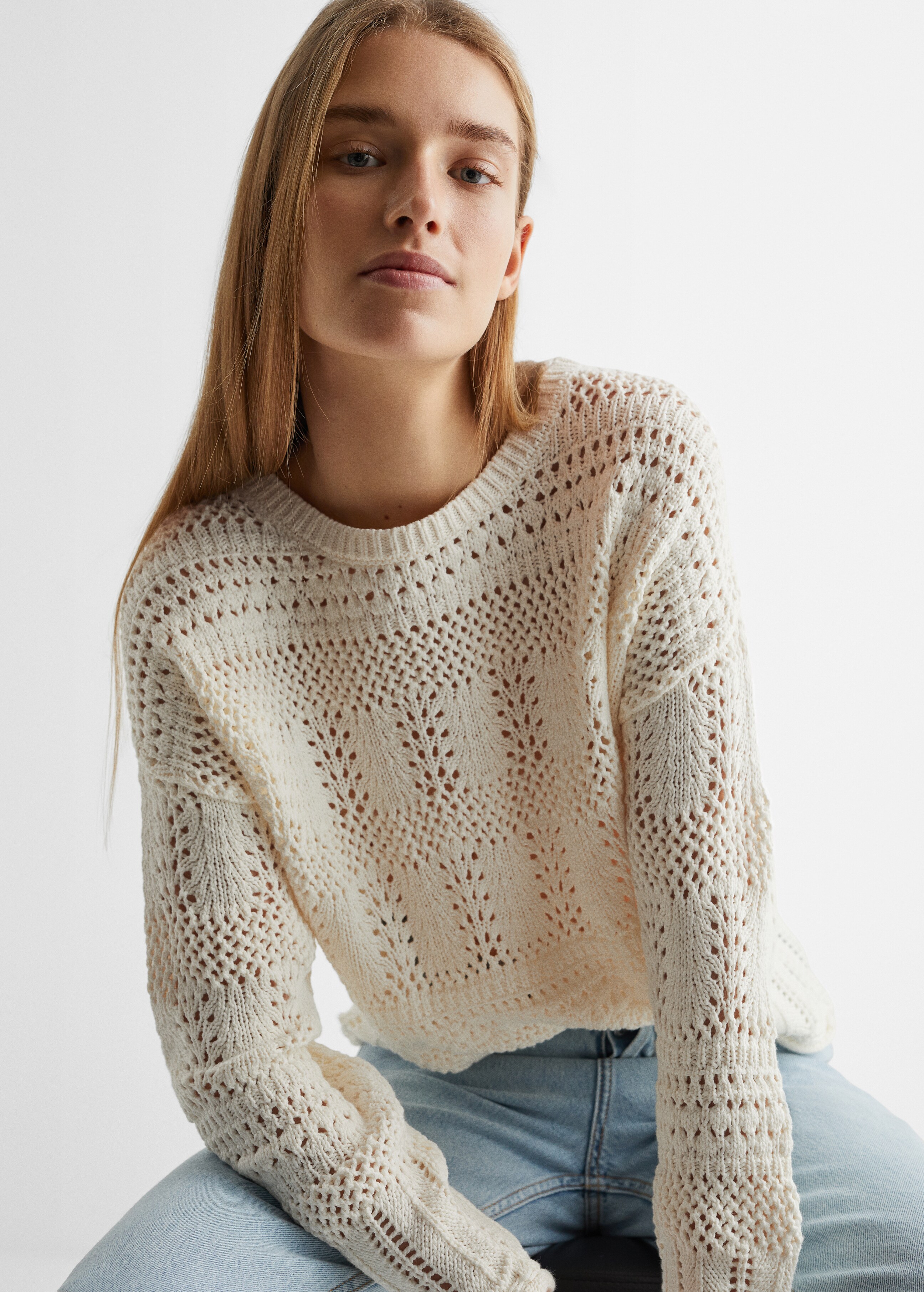 Round neck openwork-knit sweater