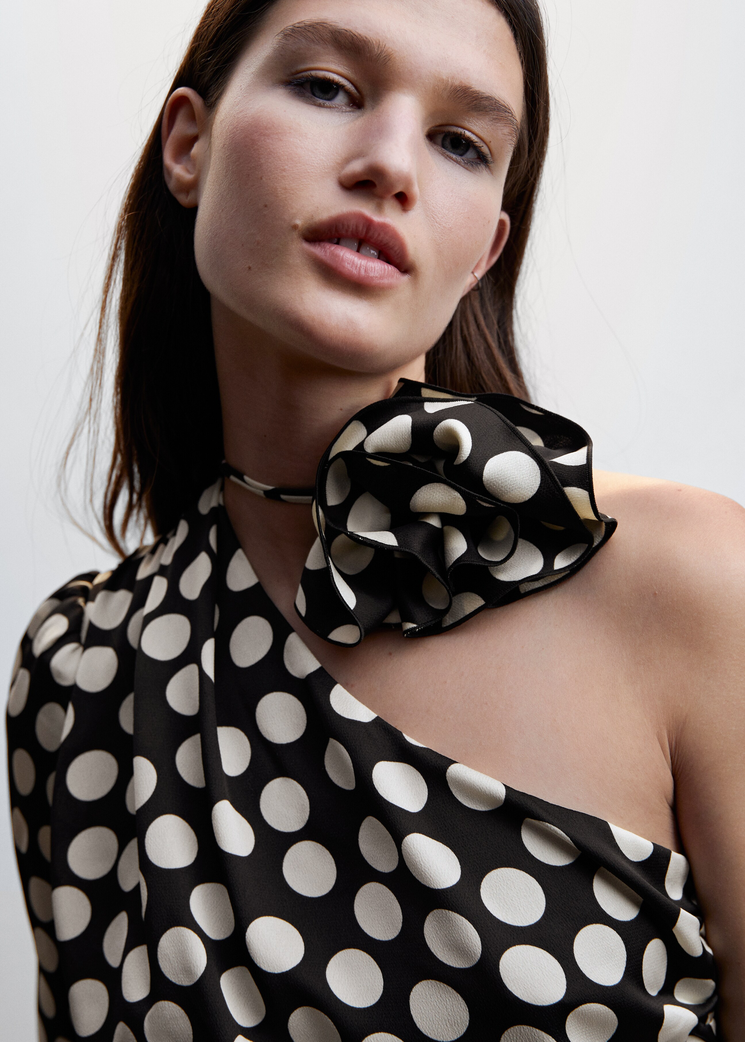 Polka-dot blouse with floral applique  - Details of the article 1