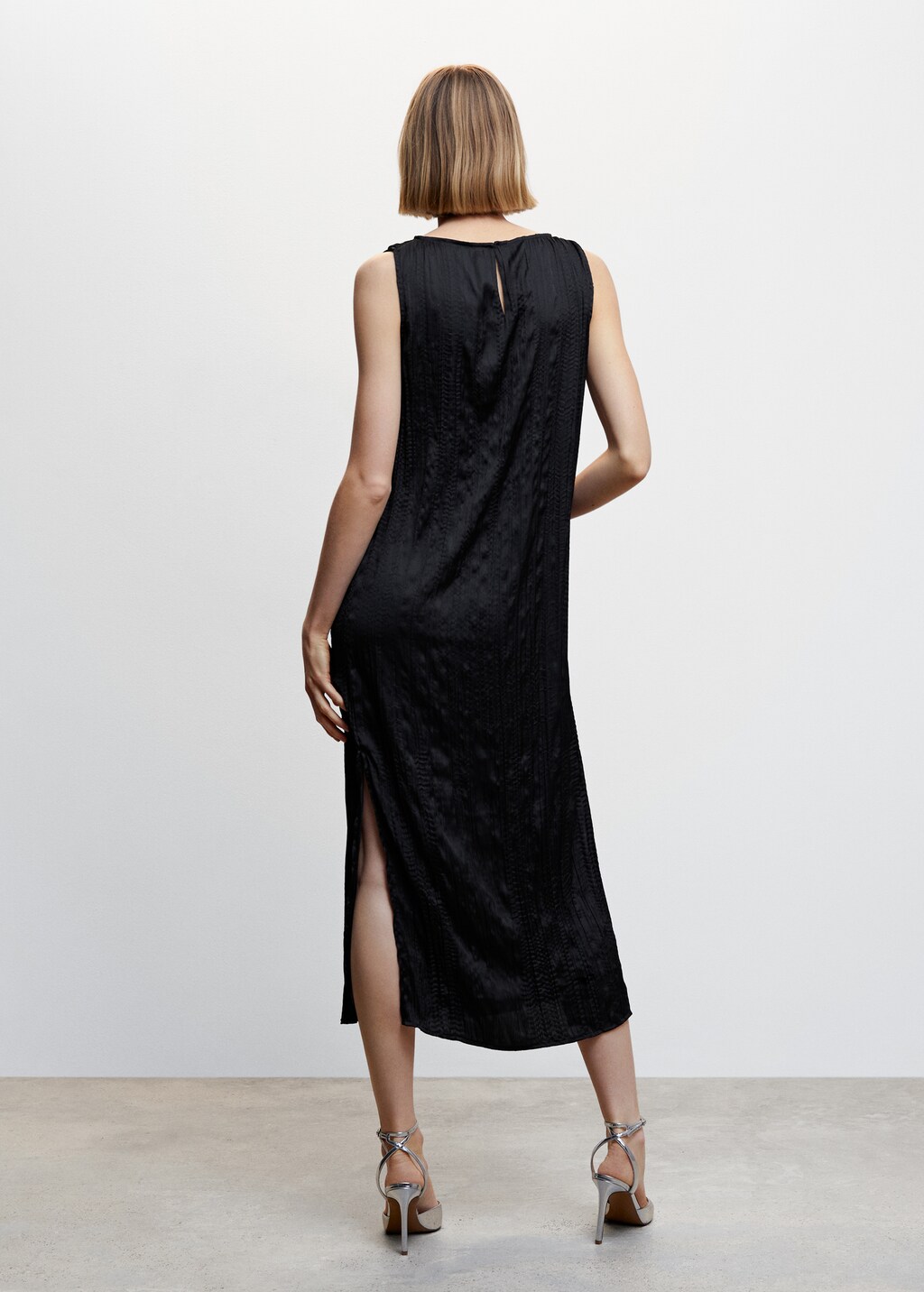 Robe noire midi texturée - Verso de l’article