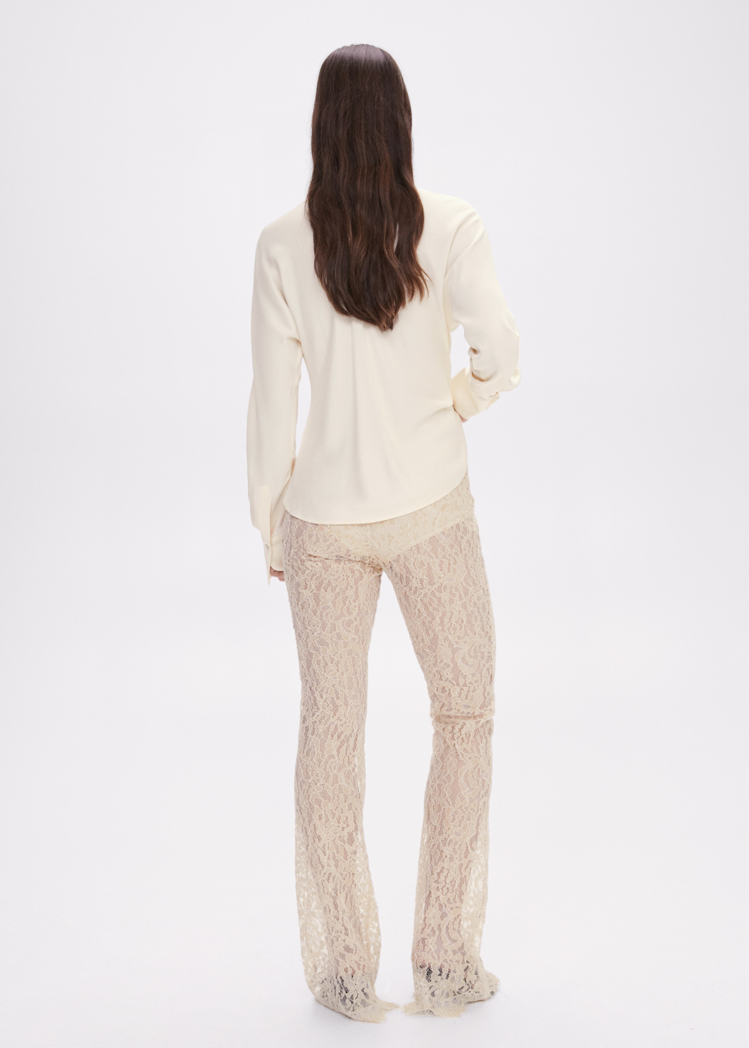 Lace flare pants - Reverse of the article