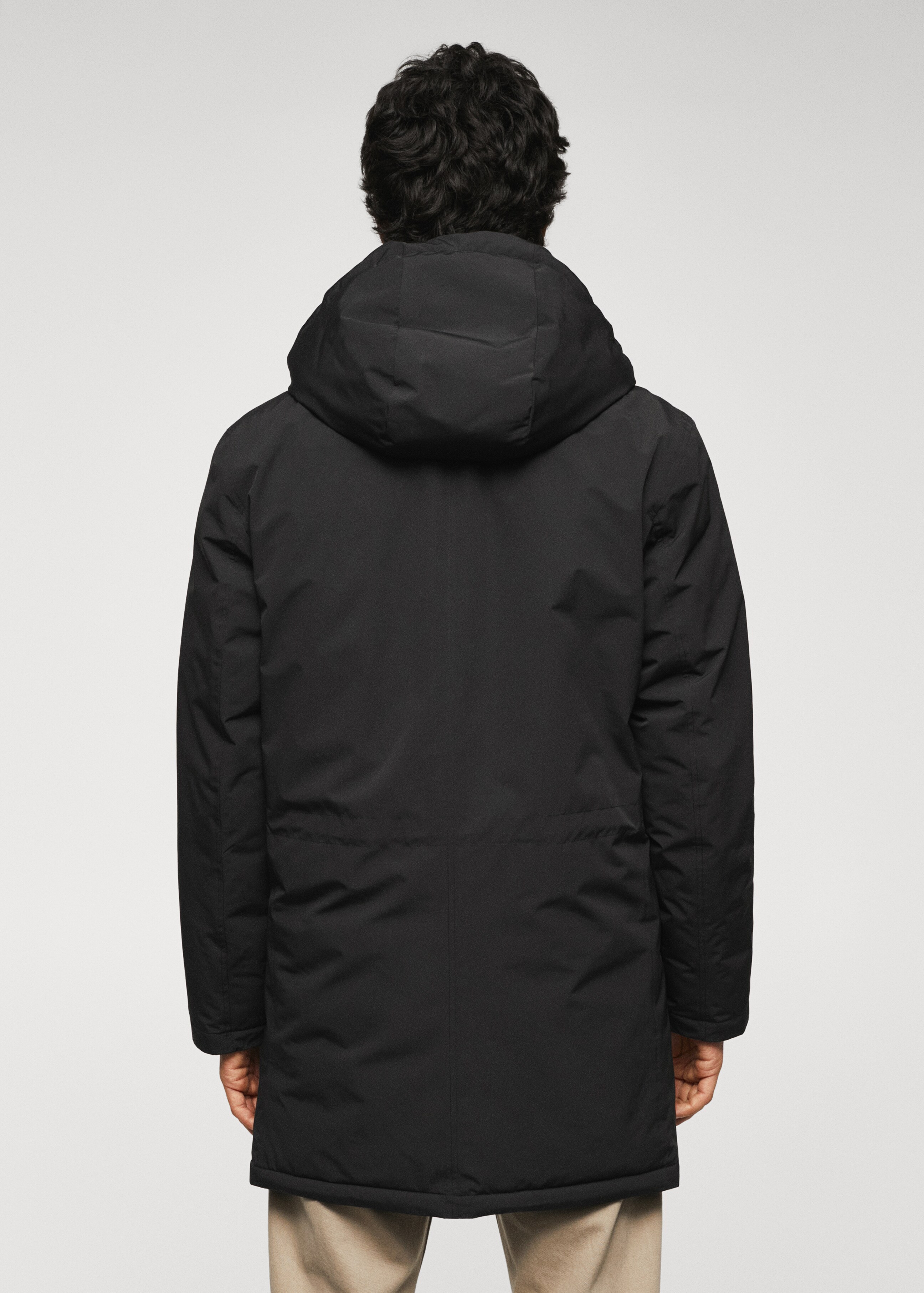 Quilted hooded parka - Reverse of the article