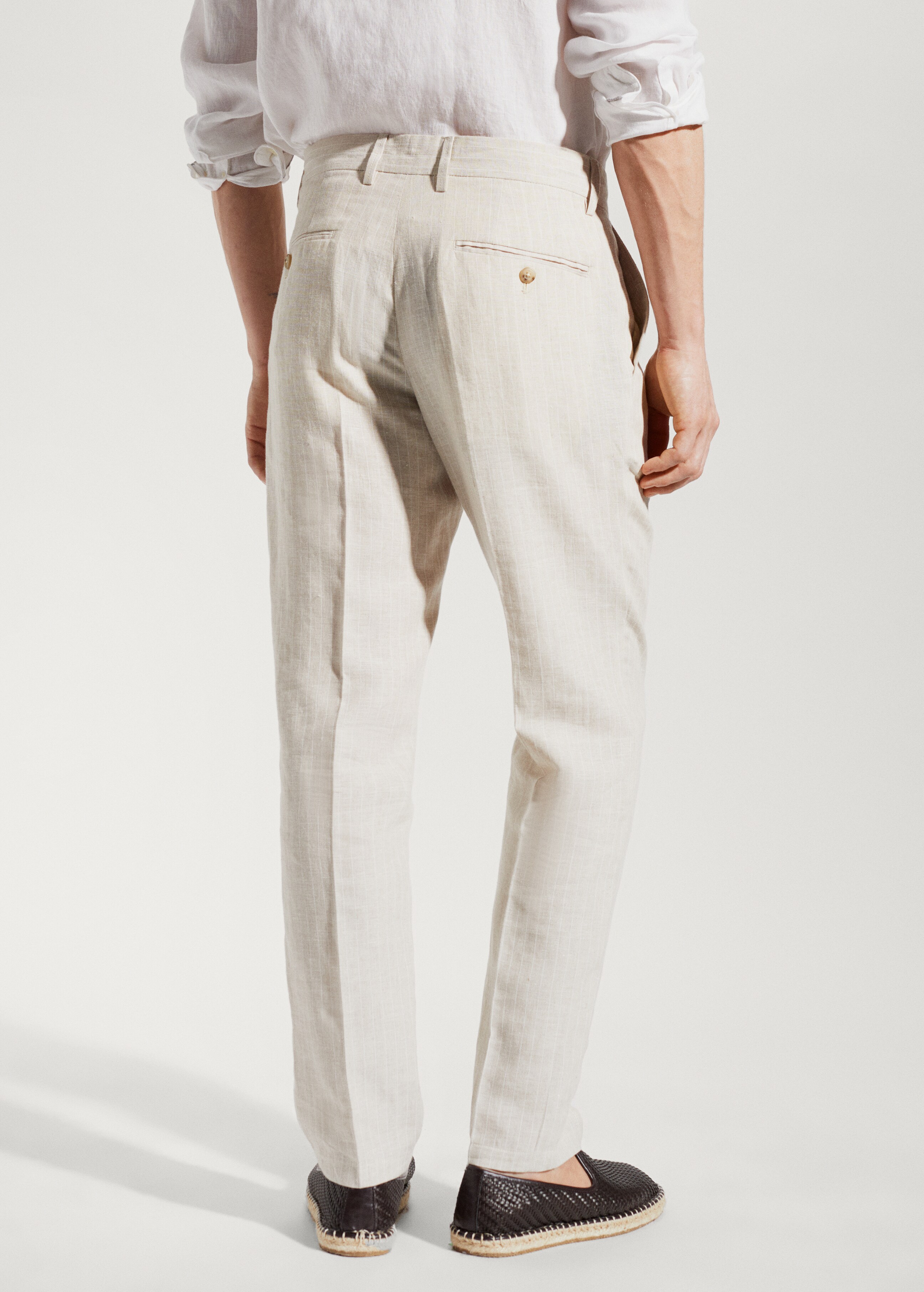 Pinstripe linen trousers - Reverse of the article