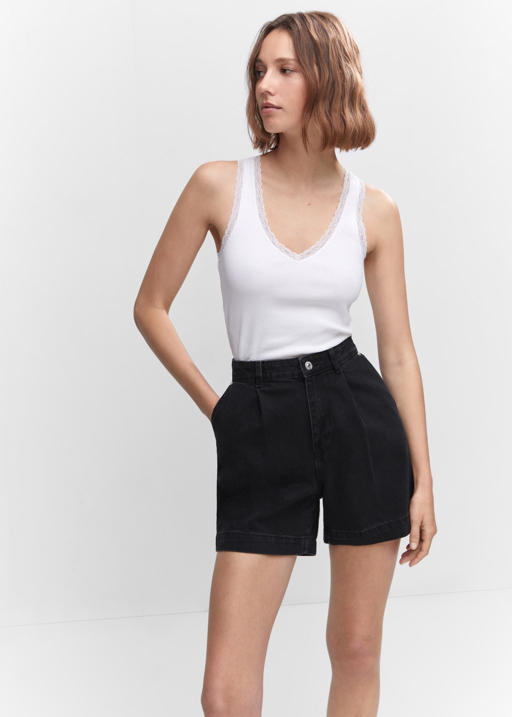 Shorts slouchy pressveck - Bild av mittparti