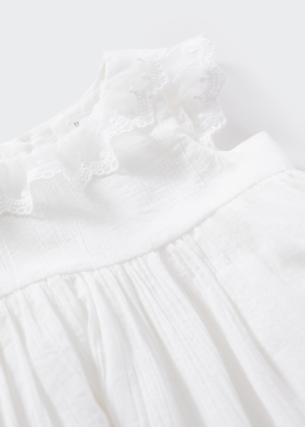 Skirt with embroidered details and nappy cover - Details of the article 8