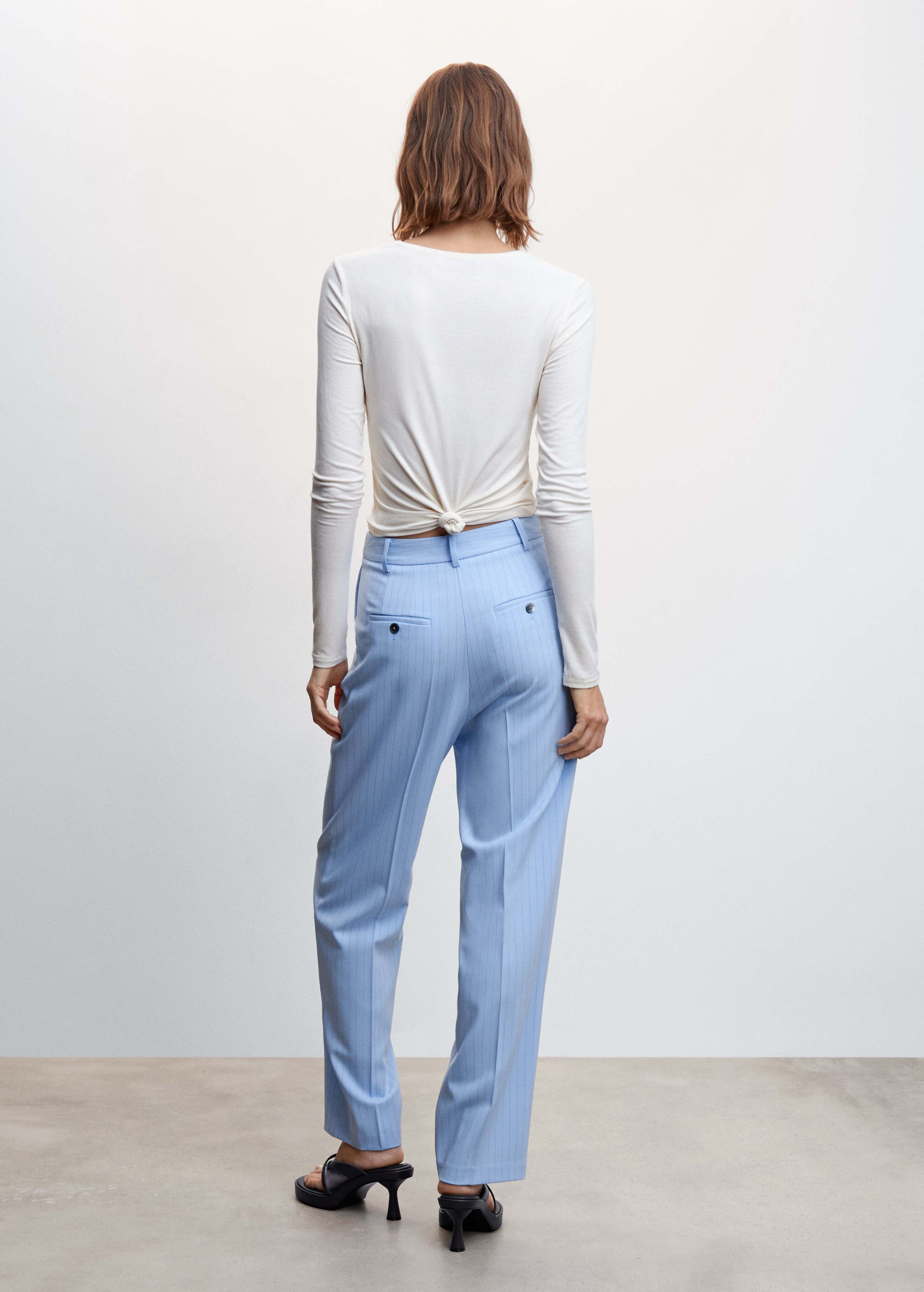 Chalk-stripe straight trousers - Reverse of the article