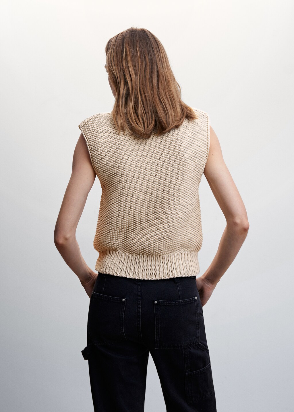 Turtleneck knitted gilet  - Reverse of the article