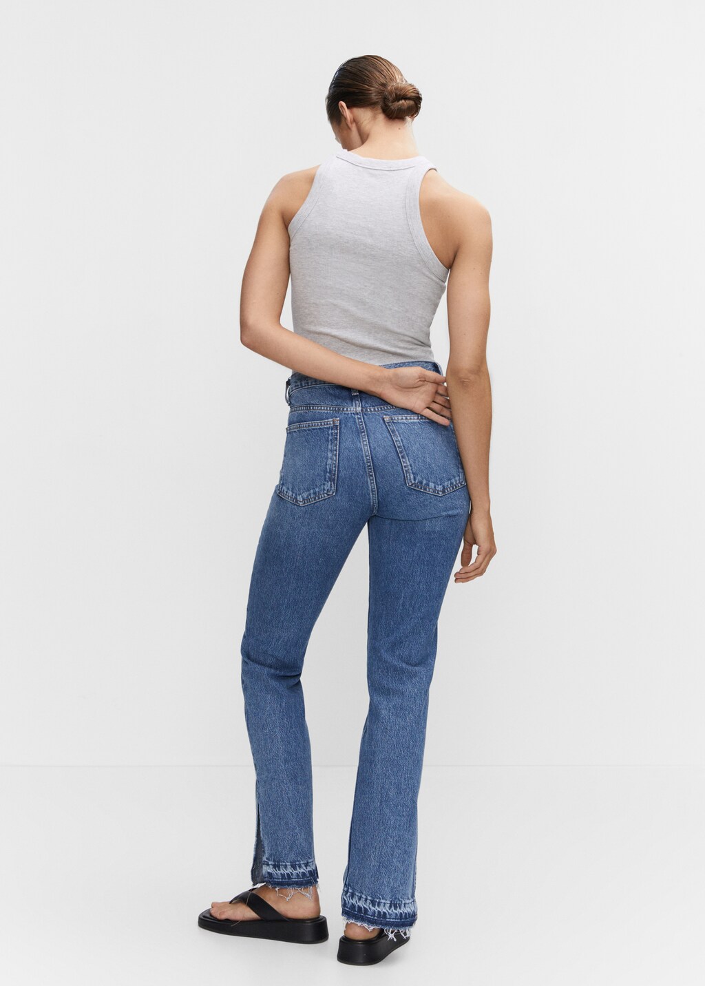 High-rise straight jeans with slits - Reverse of the article