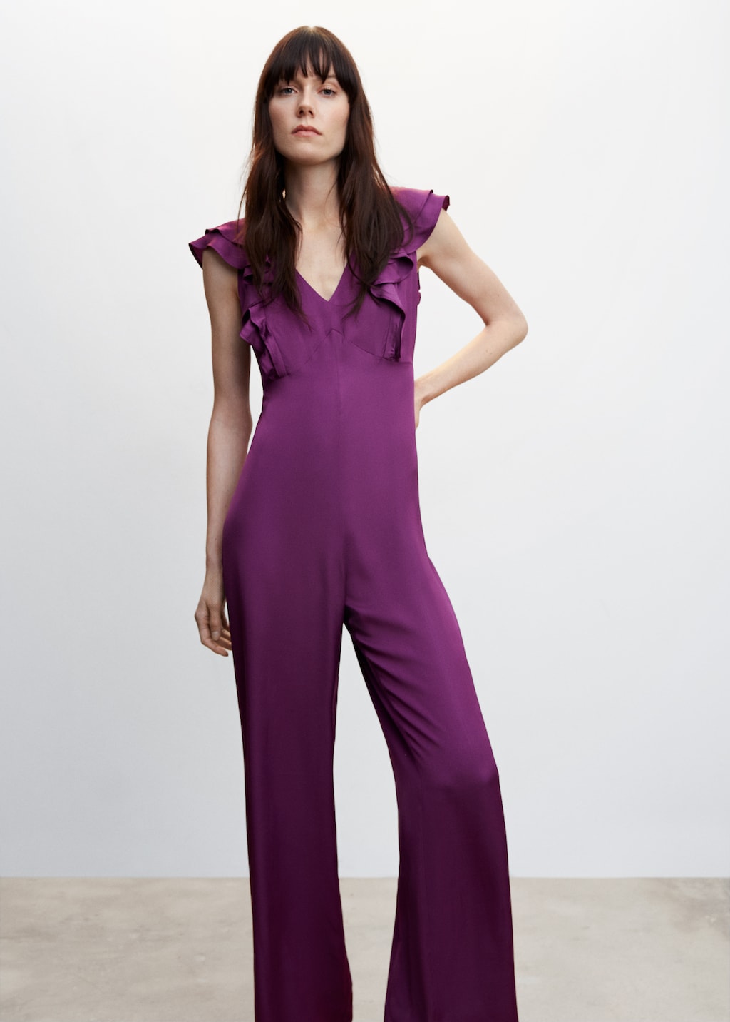 Ruffled jumpsuit with open back - Medium plane