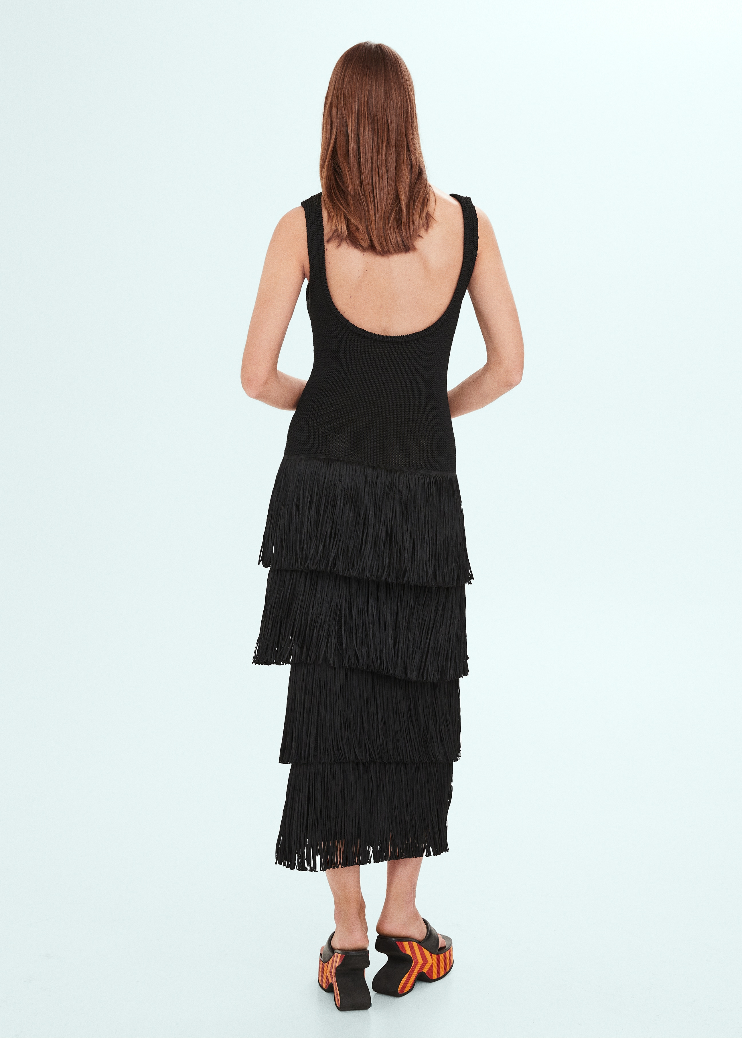 Knitted dress with fringe design