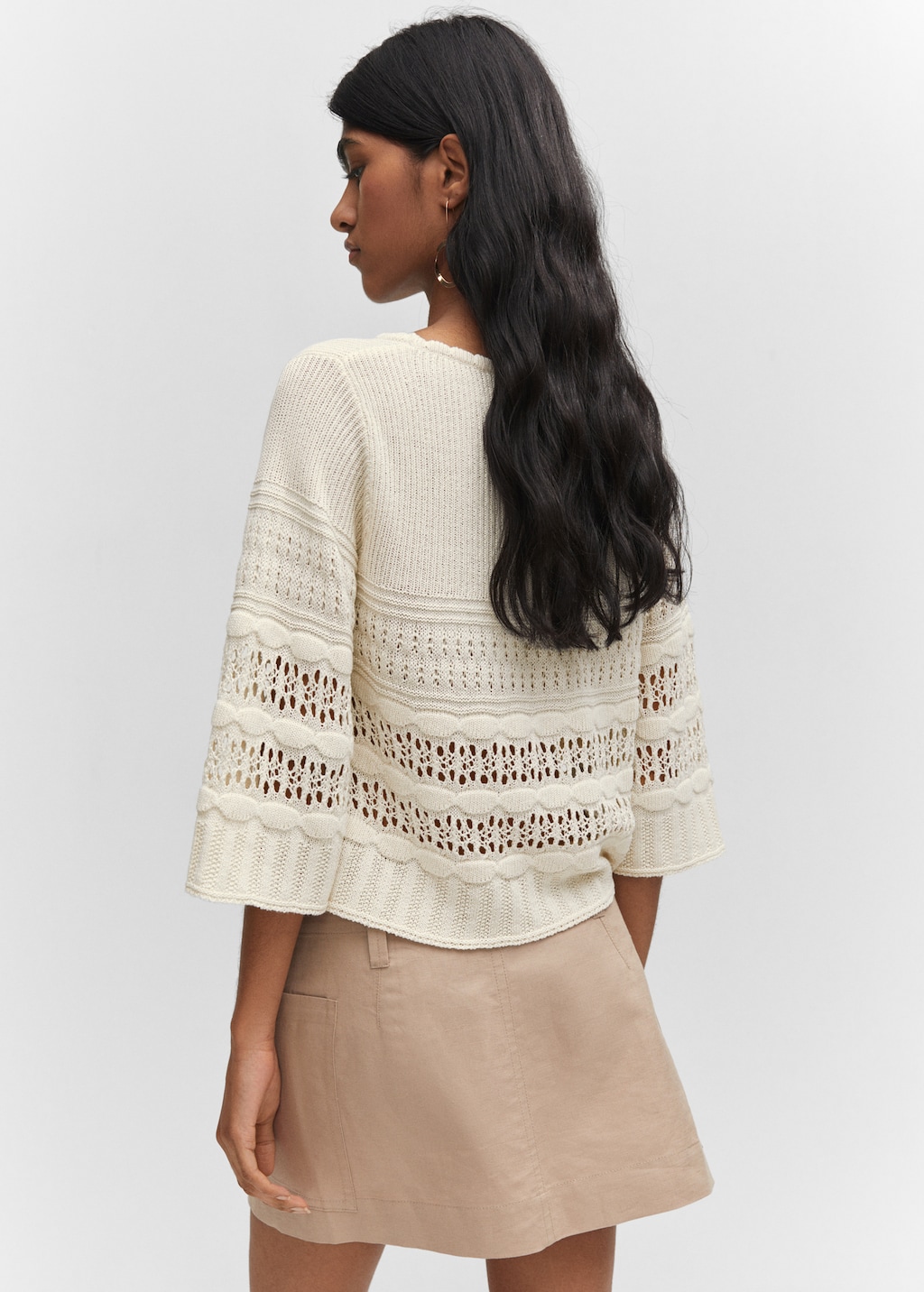 Openwork sweater with flared sleeves - Reverse of the article