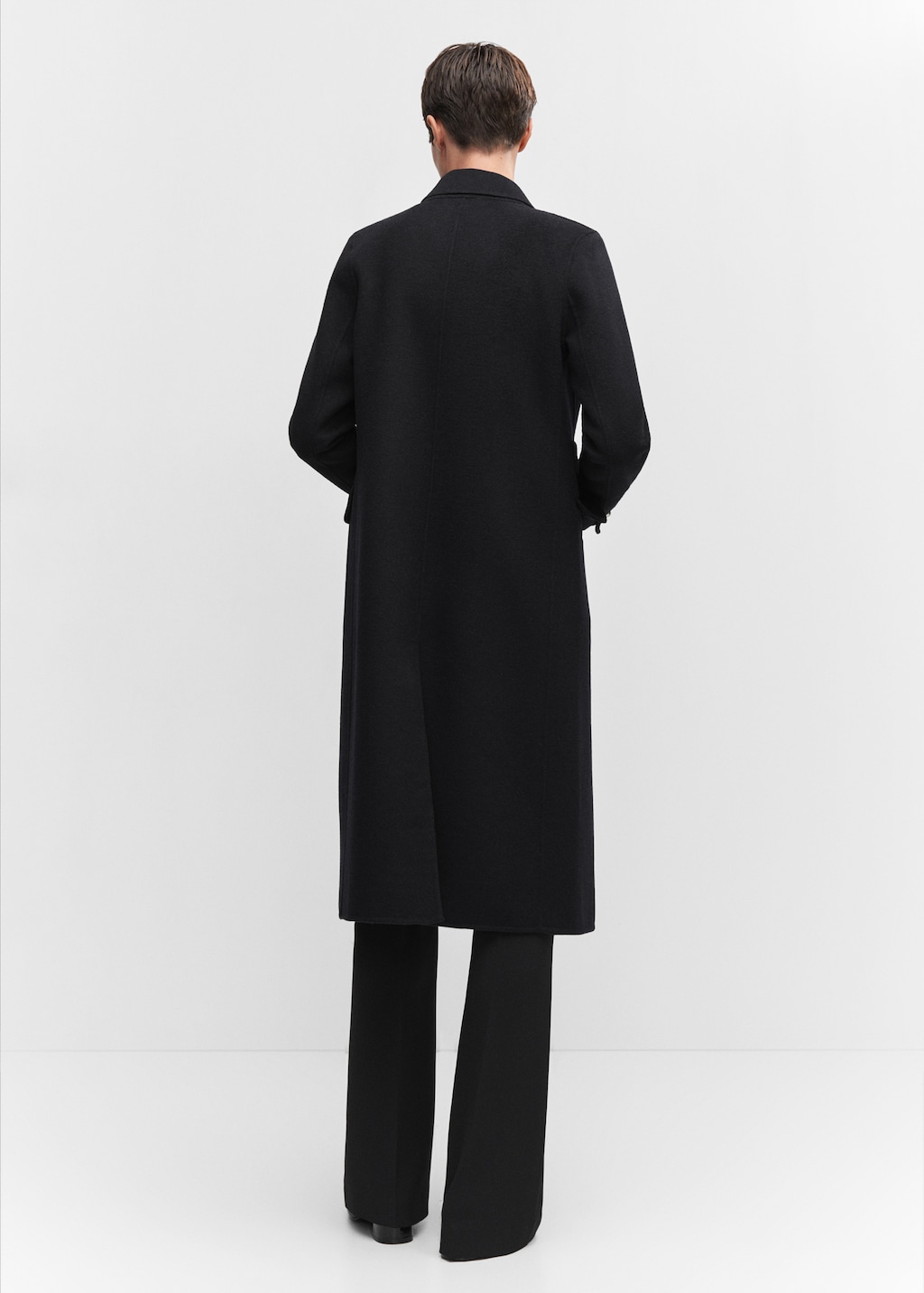 Handmade buttoned wool coat - Reverse of the article