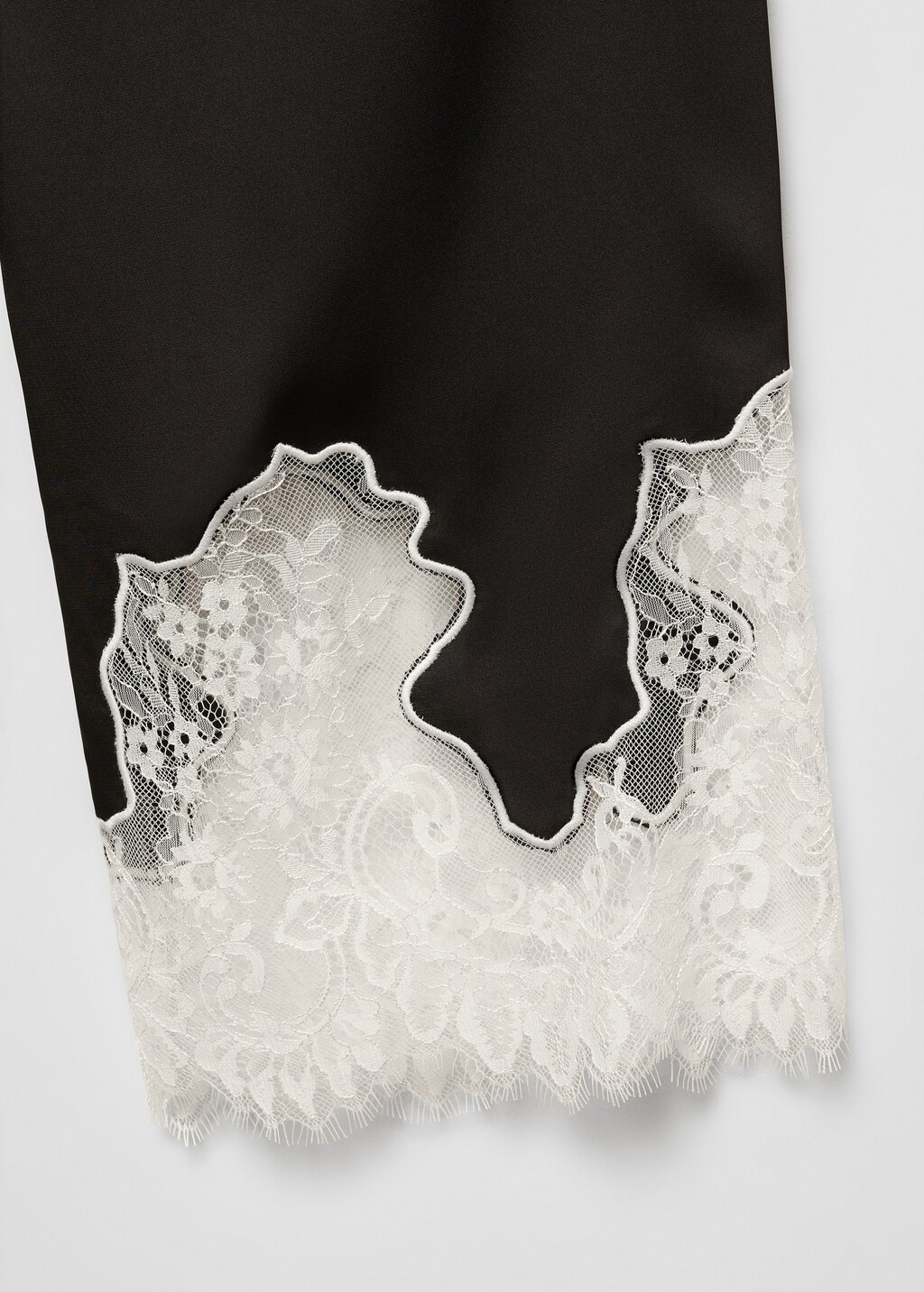 Trousers with lace hem detail  - Details of the article 8