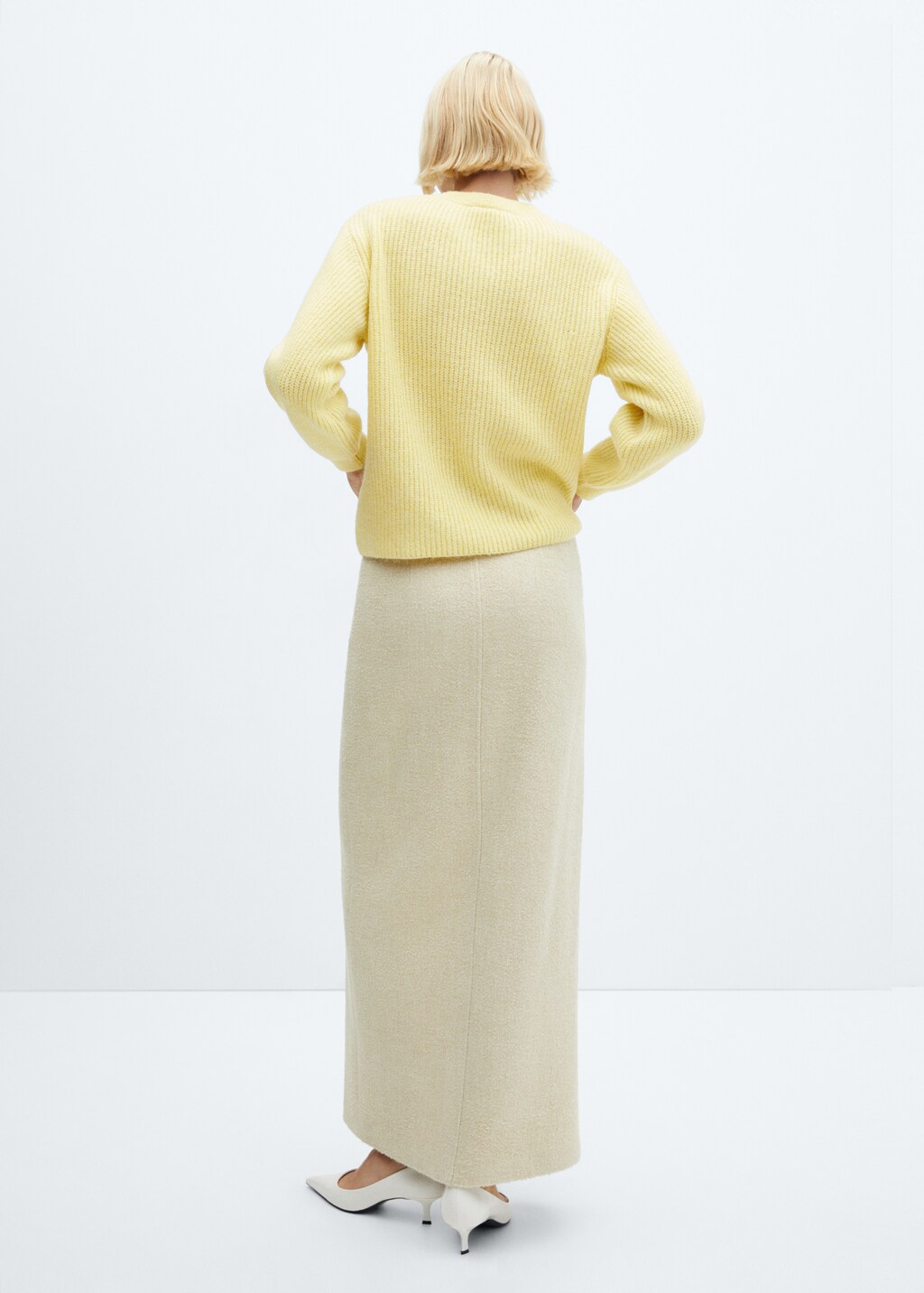 Round-neck knitted sweater - Reverse of the article