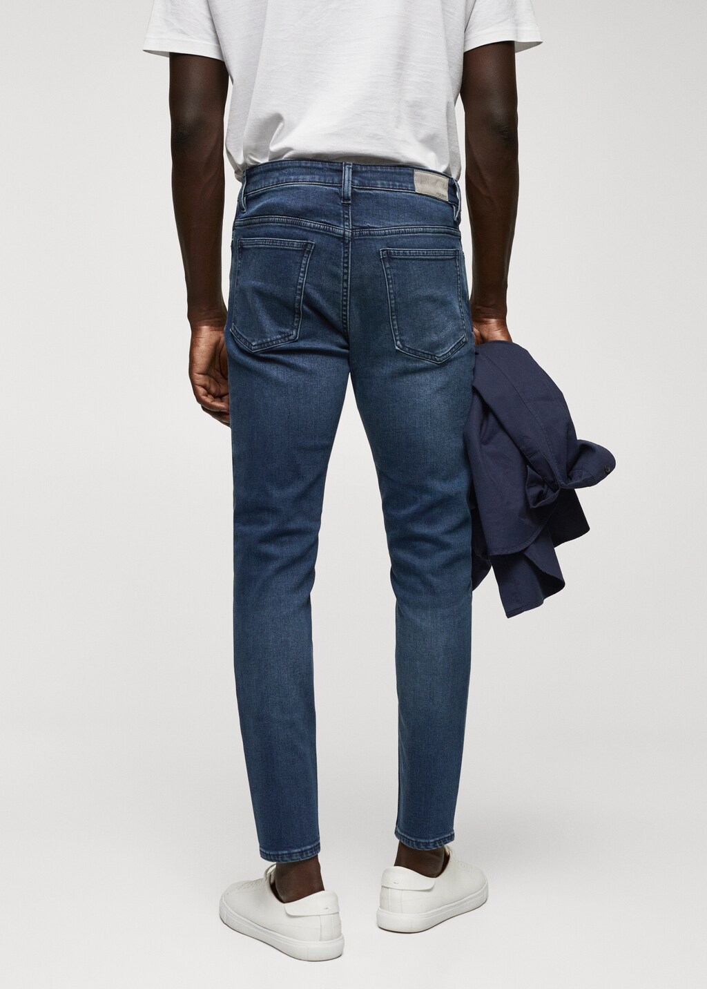 Tapered-Jeans Tom in Cropped-Länge - Rückseite des Artikels